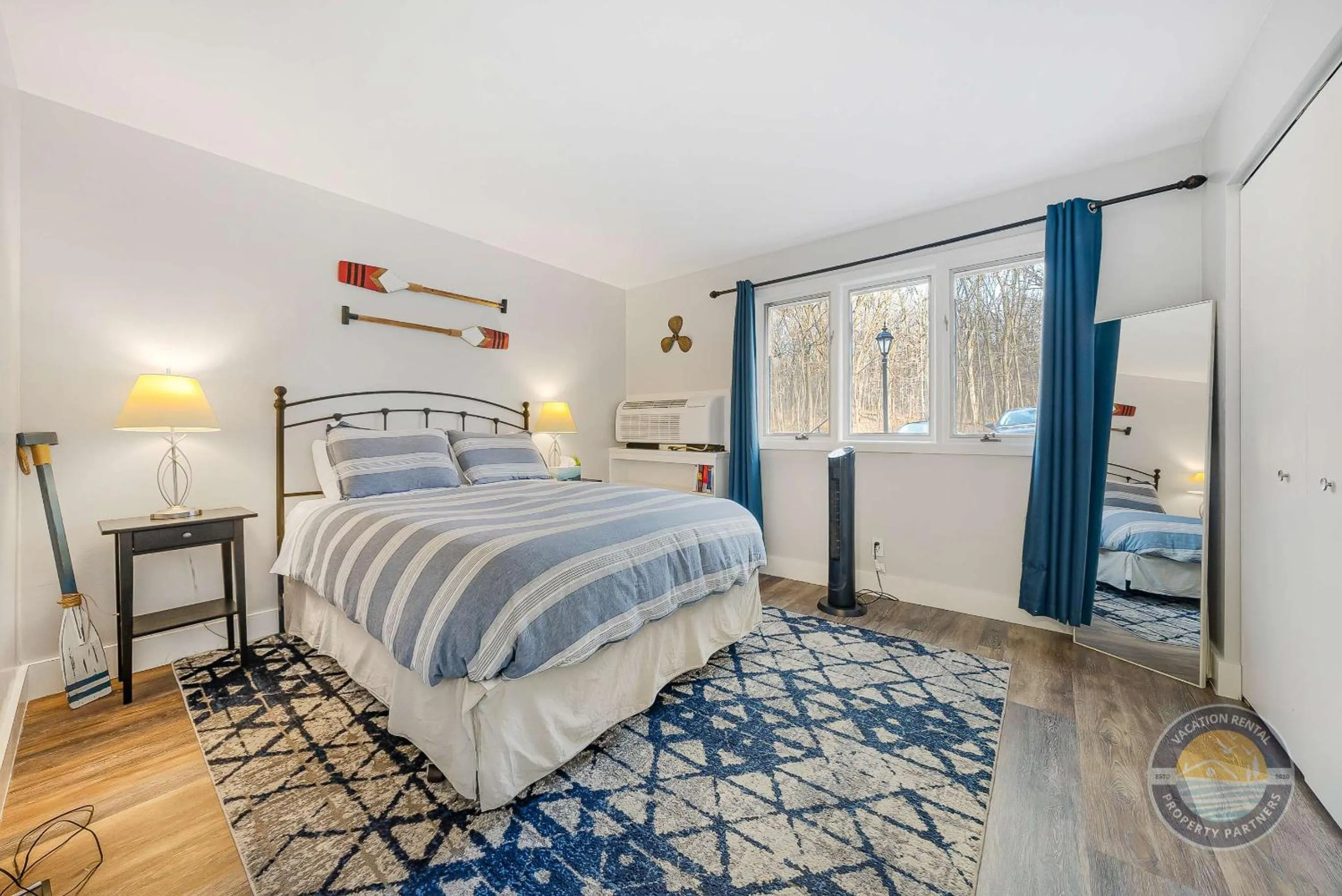 Bed in Modern Lake Geneva Condo with Year-Round Views