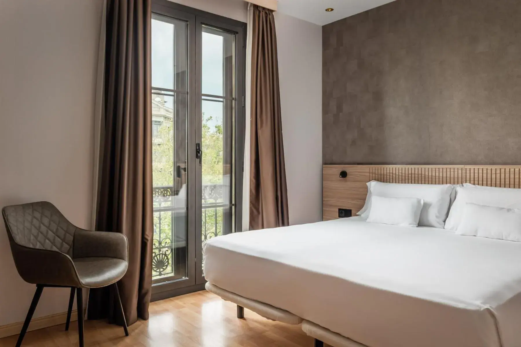 Bed in Petit Palace Eixample Bed in Petit Palace Eixample