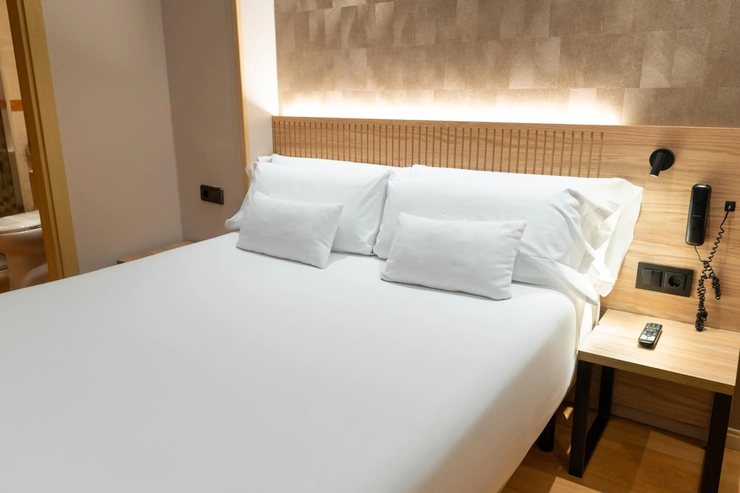 Bed in Petit Palace Eixample