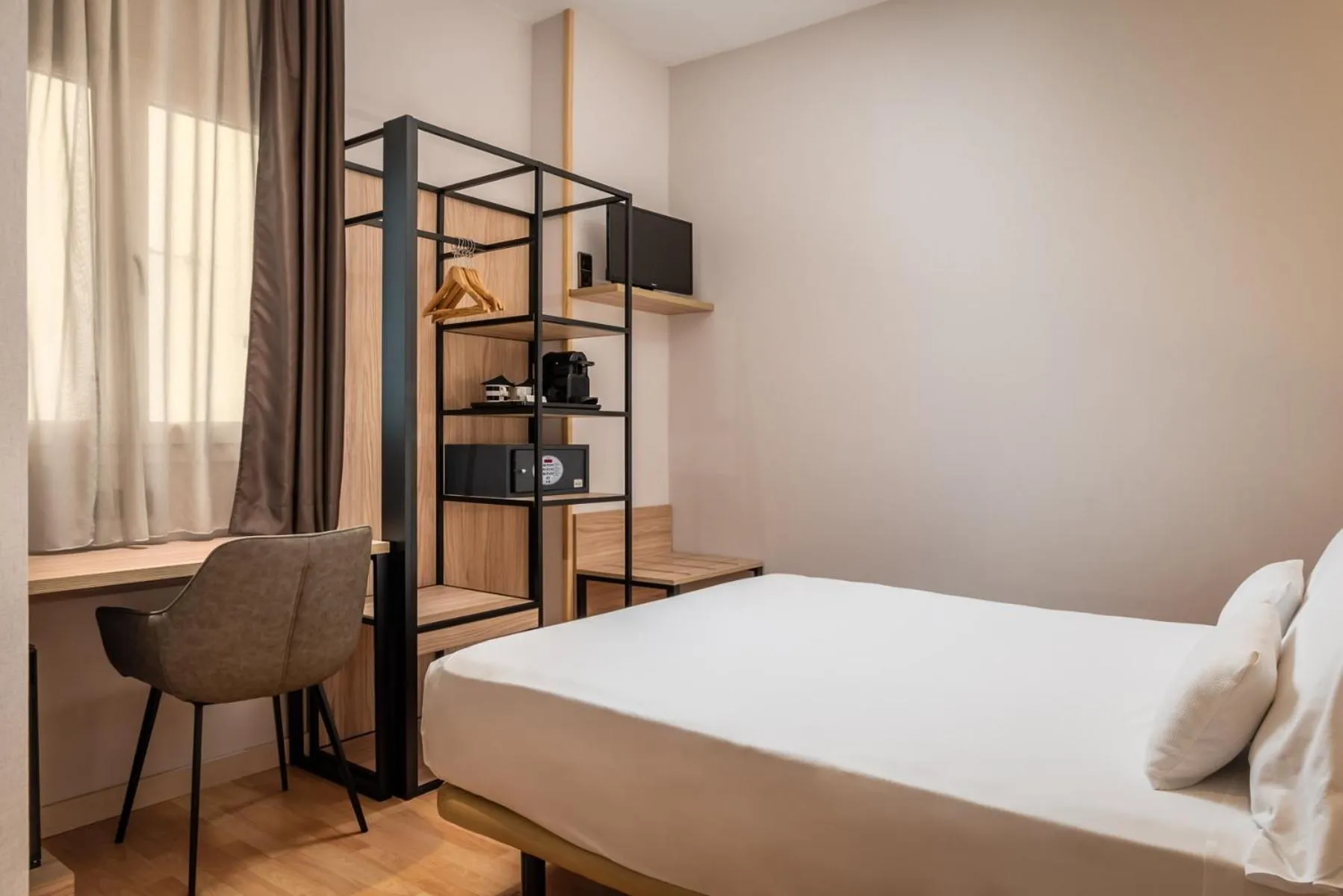 Bed in Petit Palace Eixample