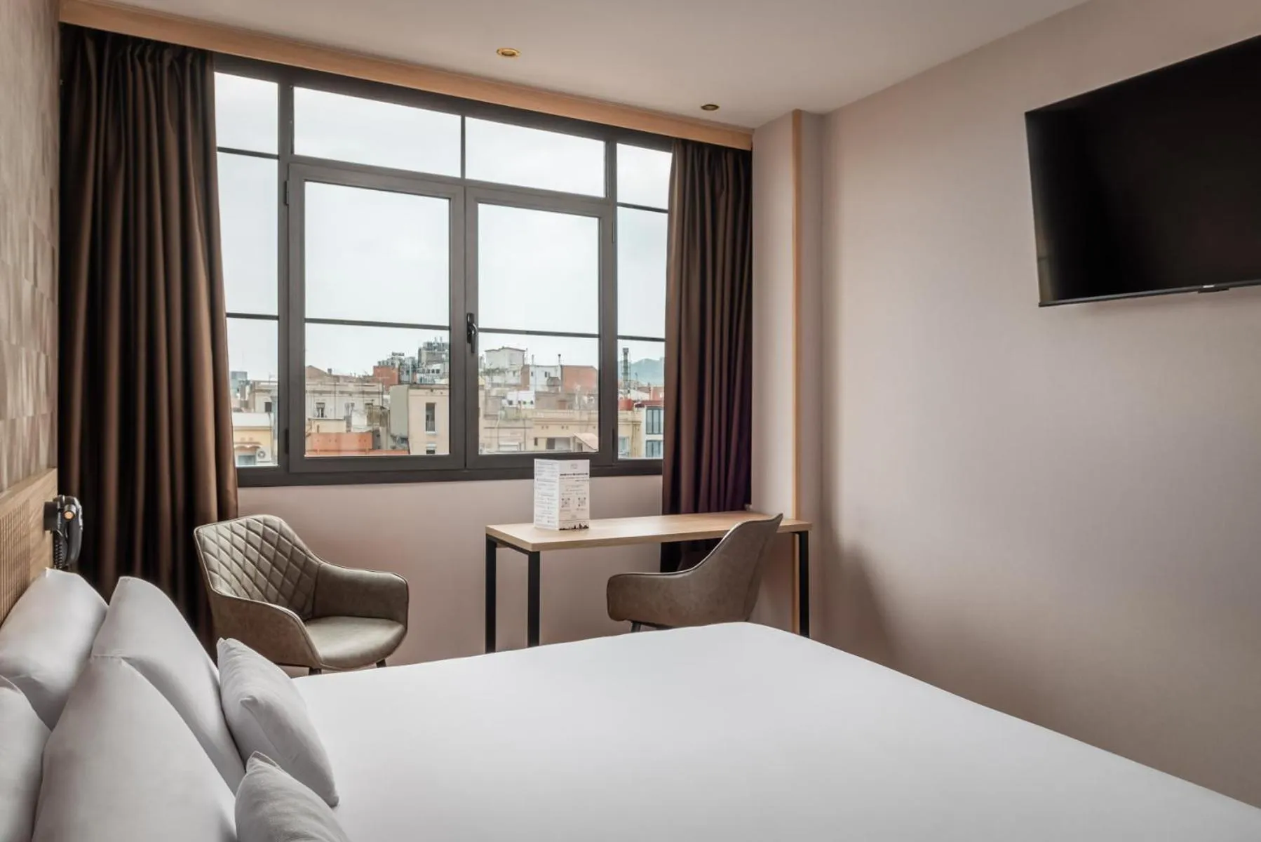 Bed in Petit Palace Eixample