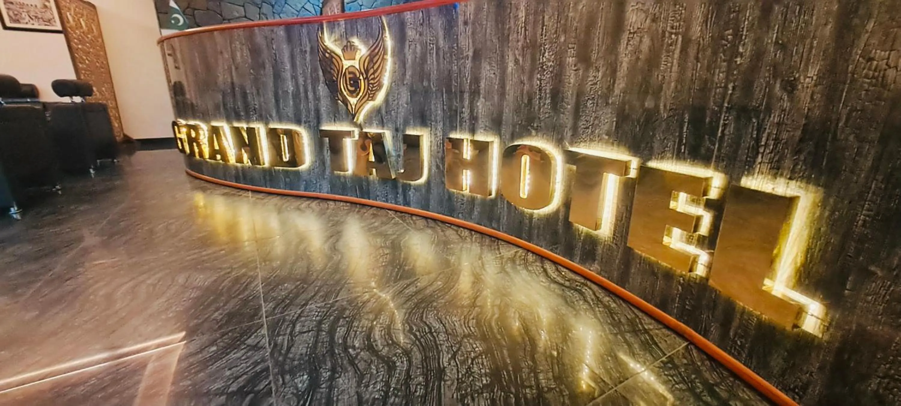 Property logo or sign in Grand Taj