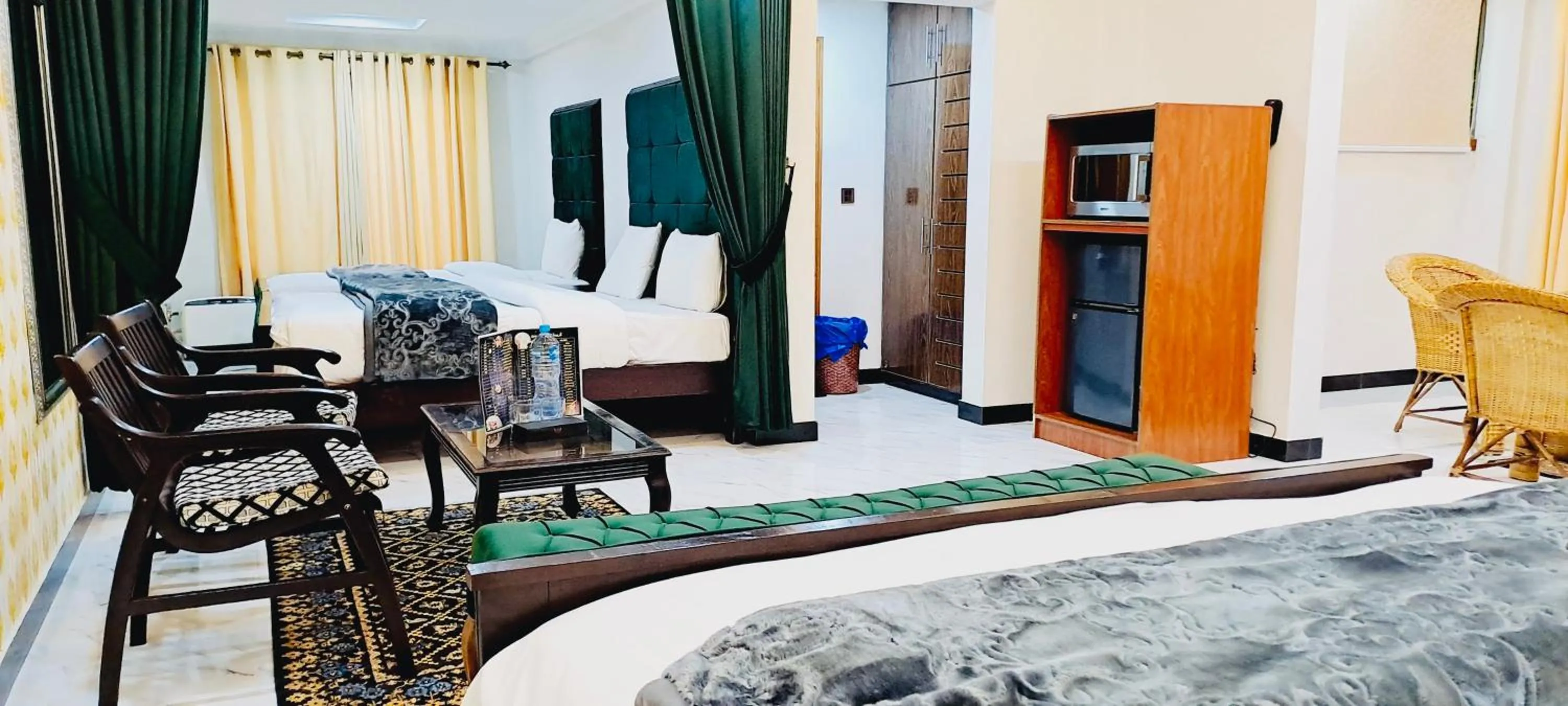 Photo of the whole room, Bed in Grand Taj