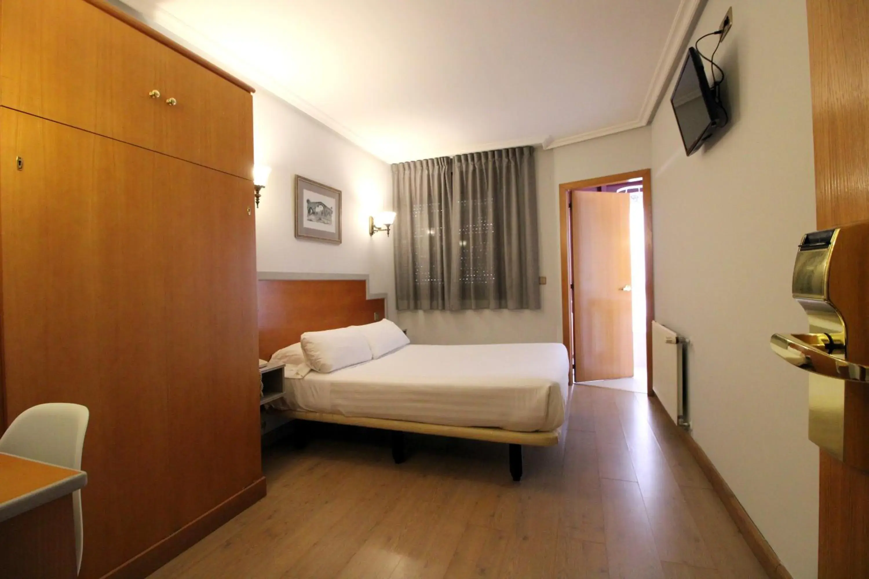 Bedroom, Bed in Hotel Carbayon Bedroom, Bed in Hotel Carbayon