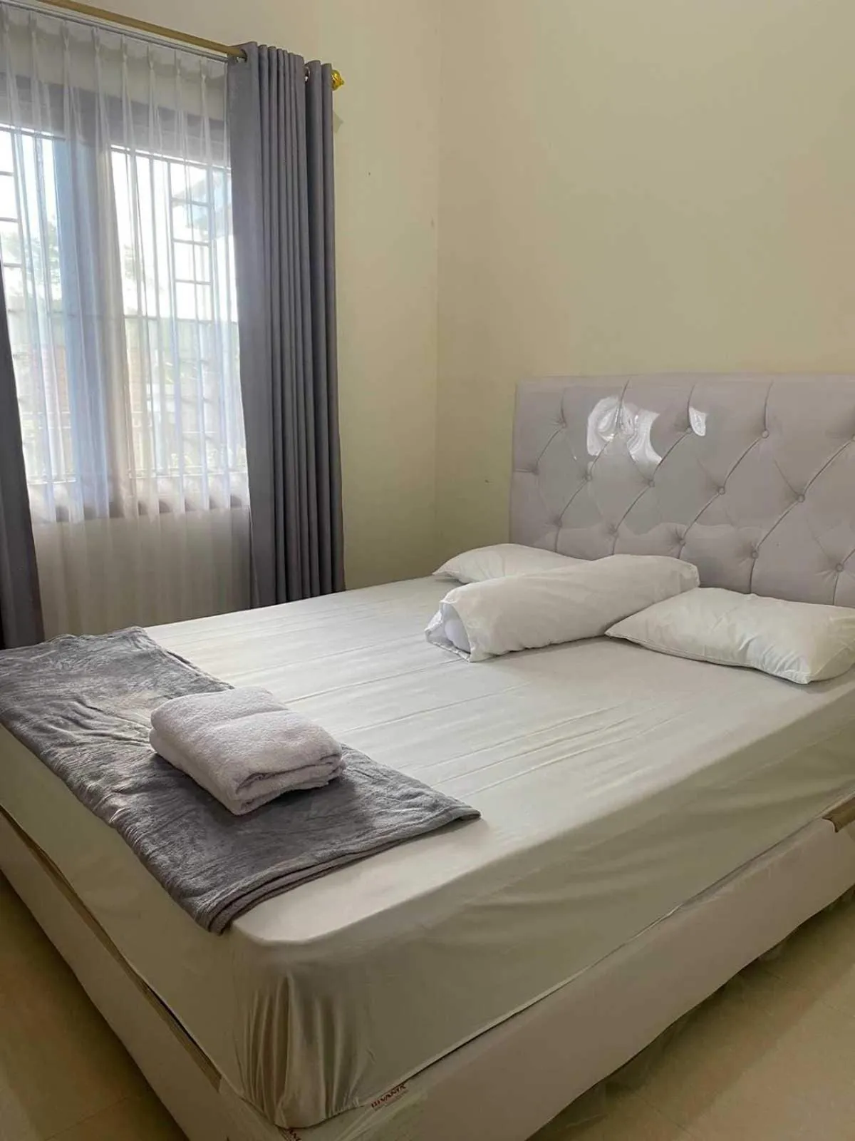 Bedroom in EXPRESS O 92106 Nayus Homestay Syariah