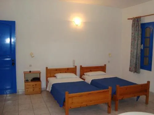 Bed in Creta Sun Hotel Studios