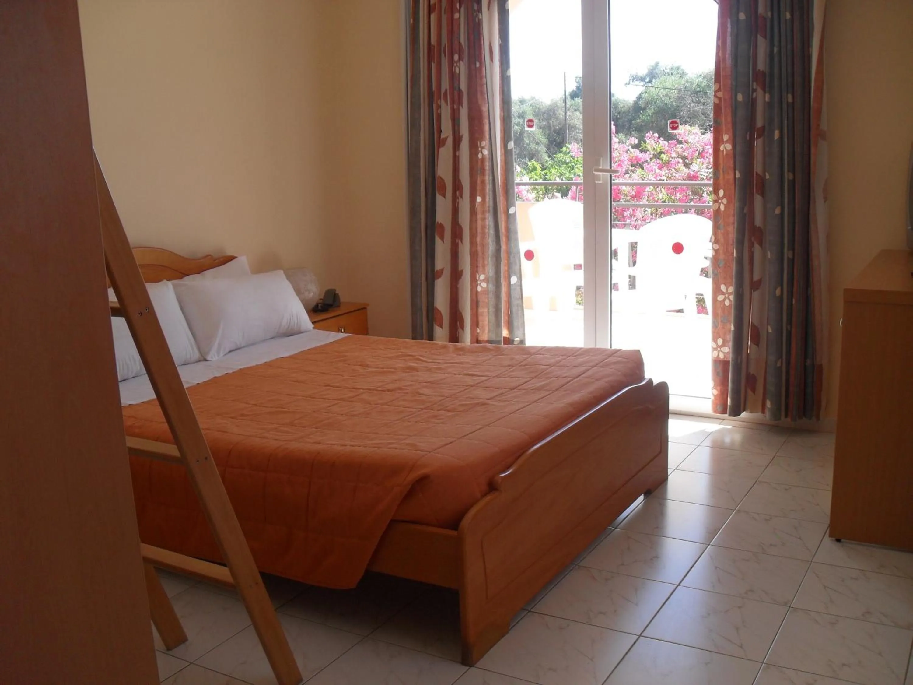 Bedroom in Pegasus Hotel