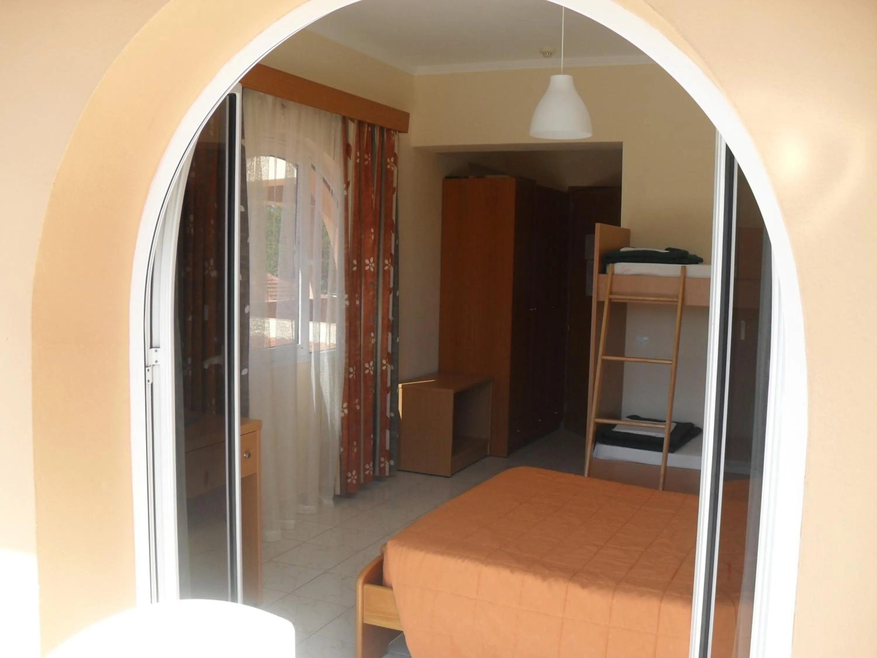 Bedroom in Pegasus Hotel