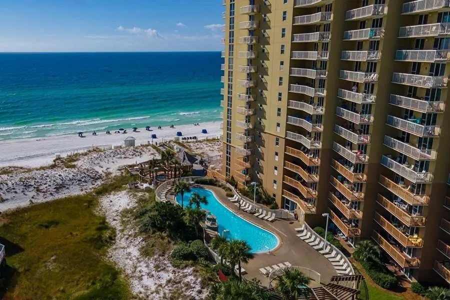 Pool view in Pelican Beach 1504 by Pelican Beach Management