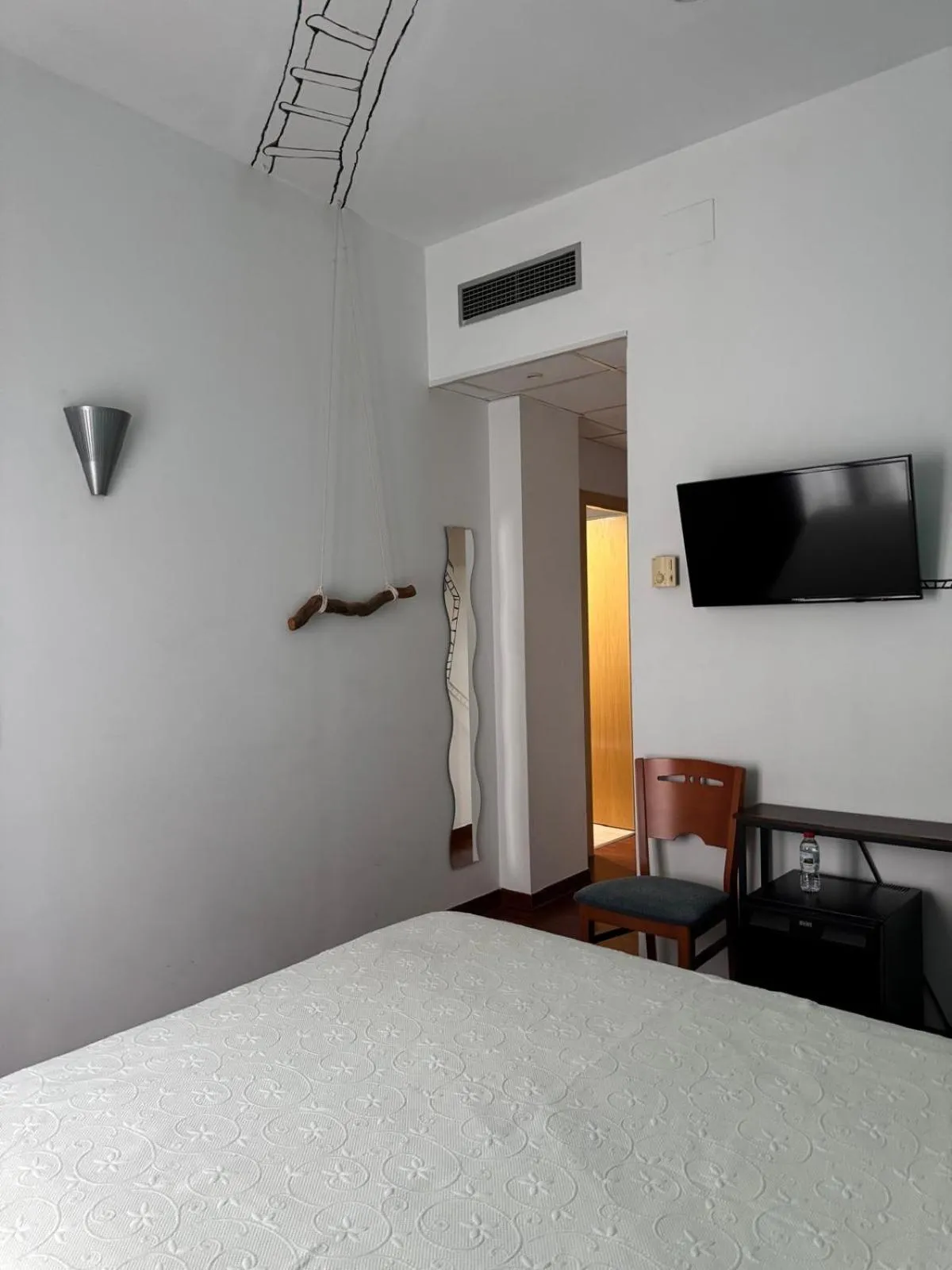 Bed in Hotel Plaza Inn