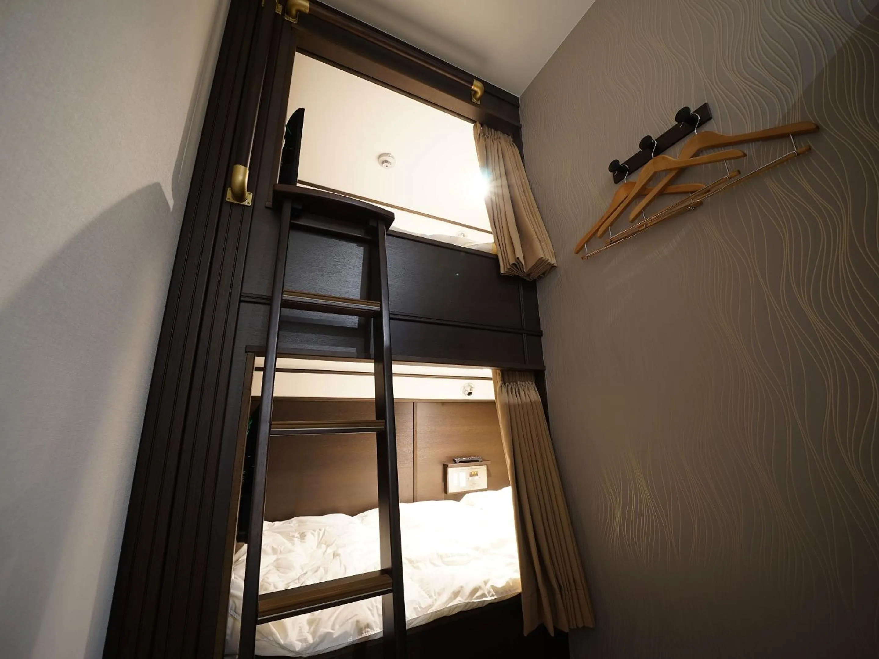 Photo of the whole room in WELLCABIN TENJIN - Male Only