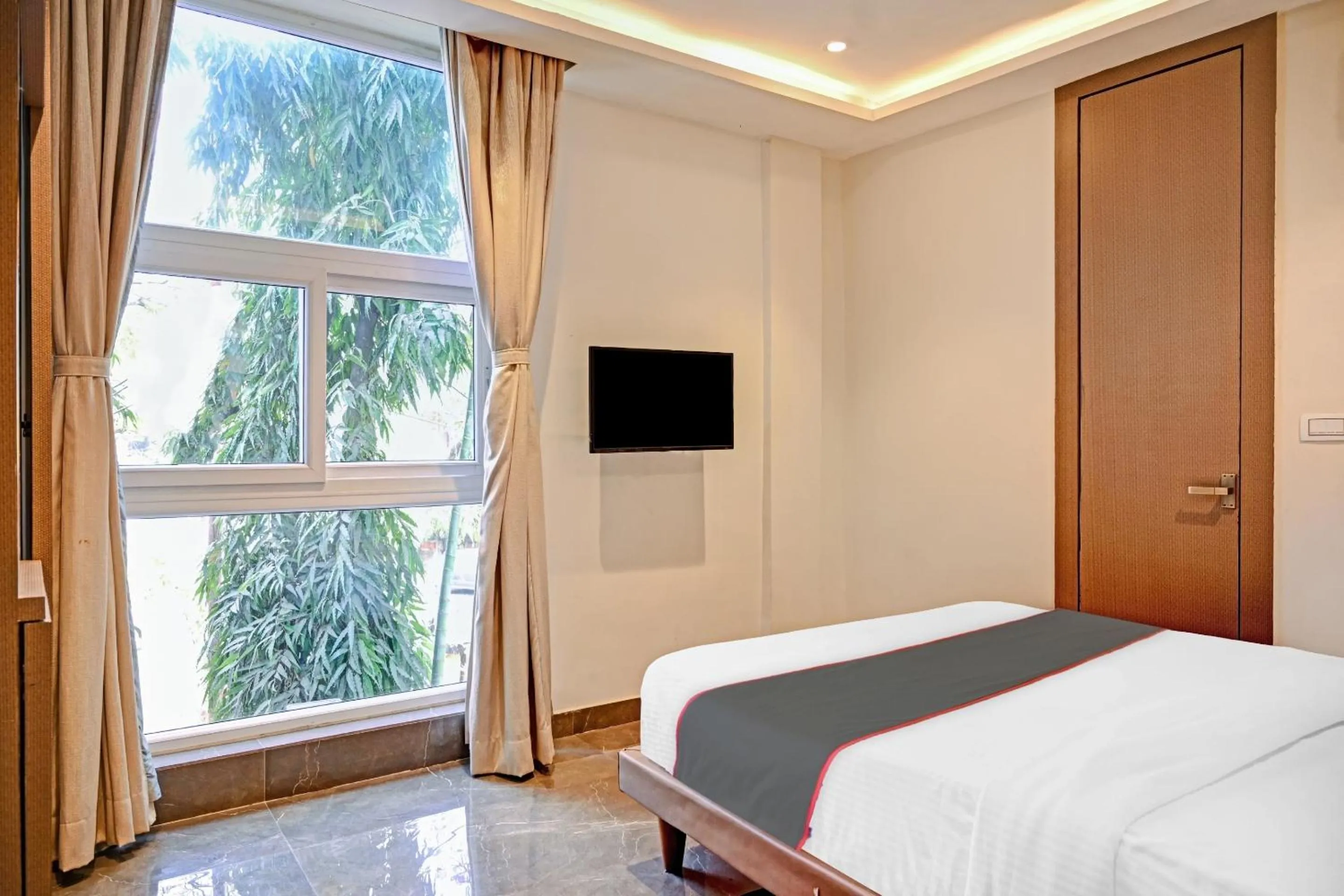 Bedroom, Bed in Super Hotel O Vrindavan