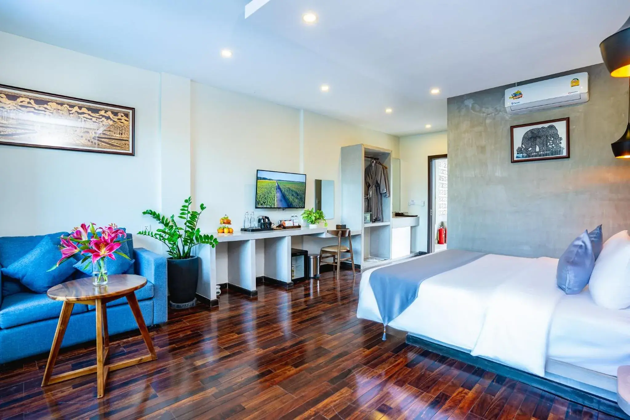 Photo of the whole room, Bed in Rainforest Hotel by NSUN Photo of the whole room, Bed in Rainforest Hotel by NSUN