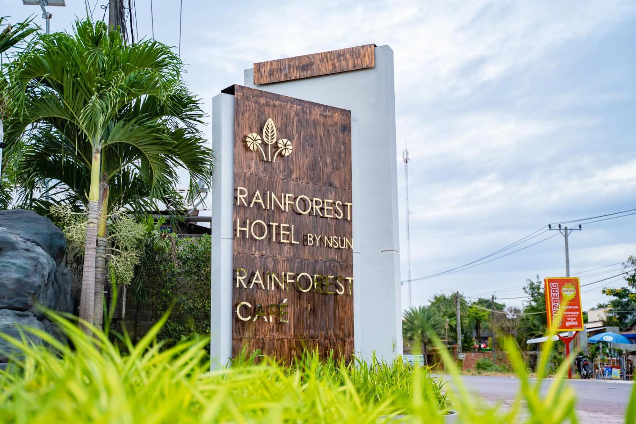 Property logo or sign in Rainforest Hotel by NSUN