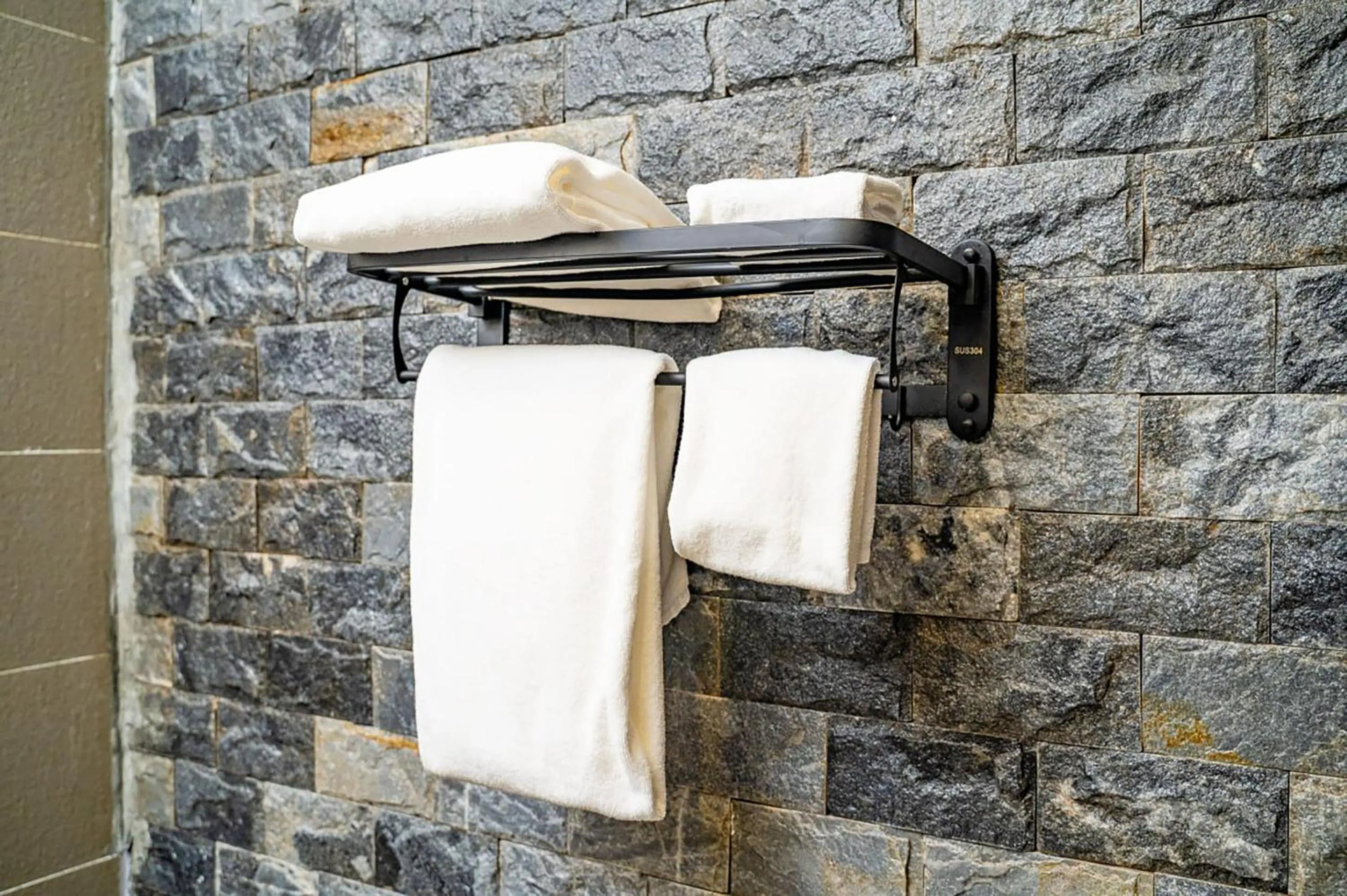 Bathroom in Rainforest Hotel by NSUN