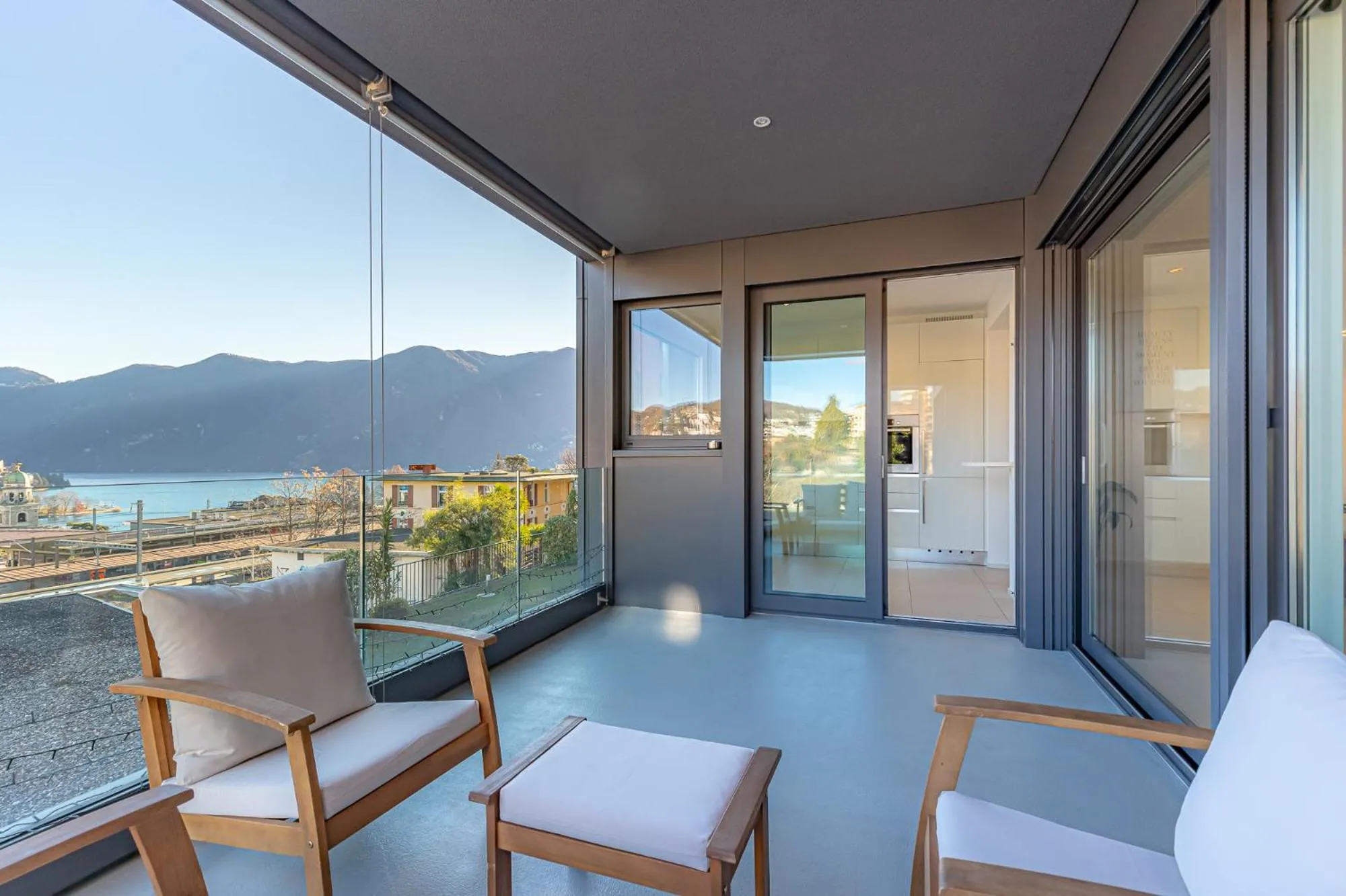 View (from property/room) in IMPERIAL of LUGANO 3 with a lake view behind the station and 10 min from the lake of Lugano