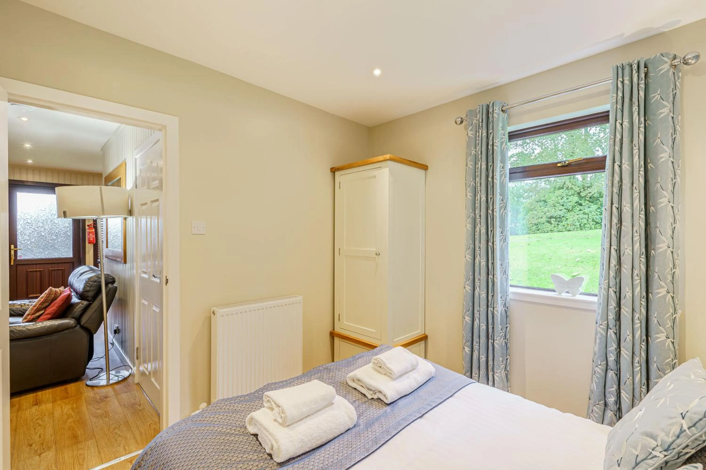 Bed in Birch Lodge 19 with Hot Tub