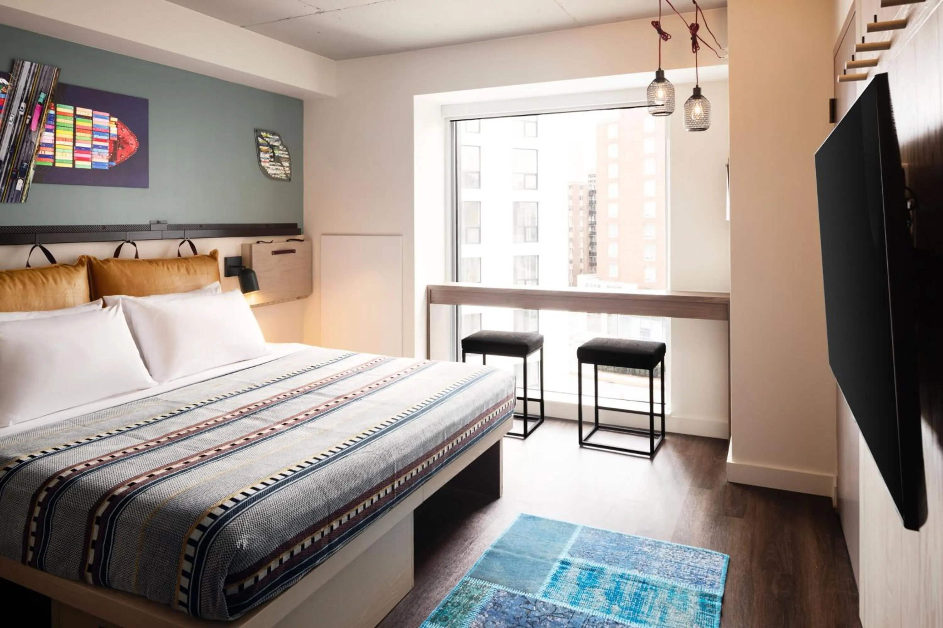 Photo of the whole room, Bed in Moxy Halifax Downtown