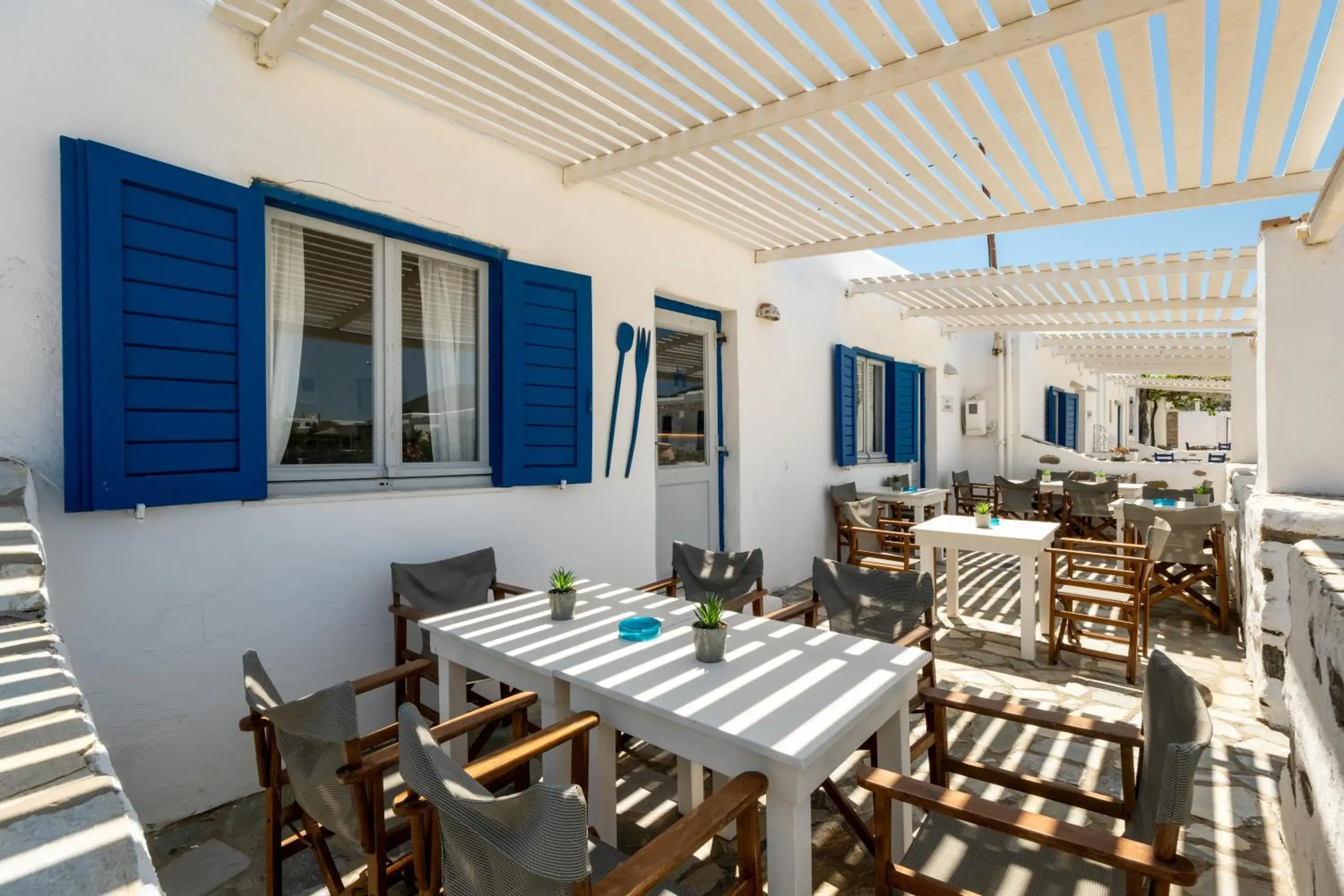 Lounge or bar in Naoussa Hotel Paros by Booking Kottas Lounge or bar in Naoussa Hotel Paros by Booking Kottas