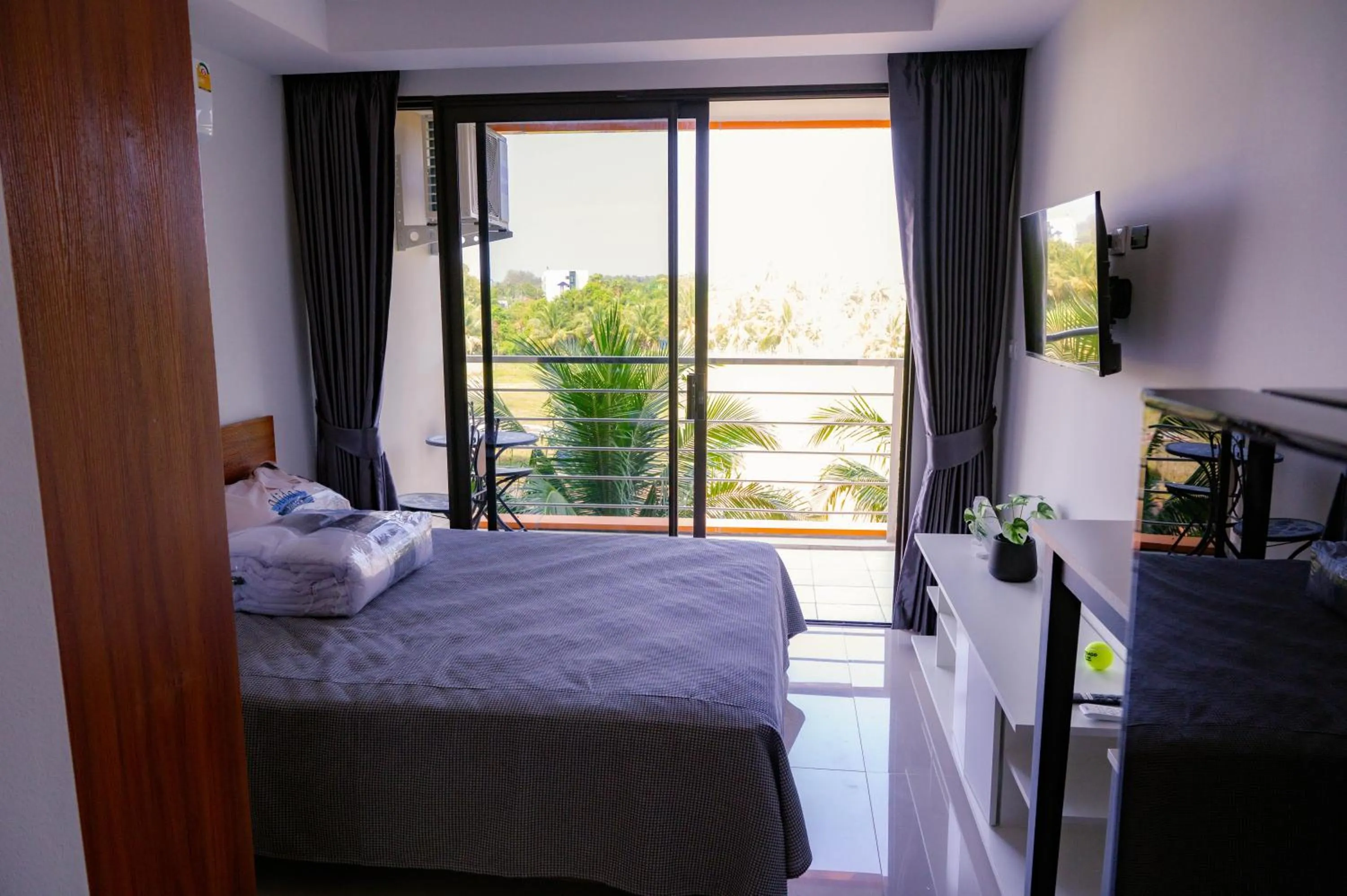 Bed in 777 Beach Condo Phuket