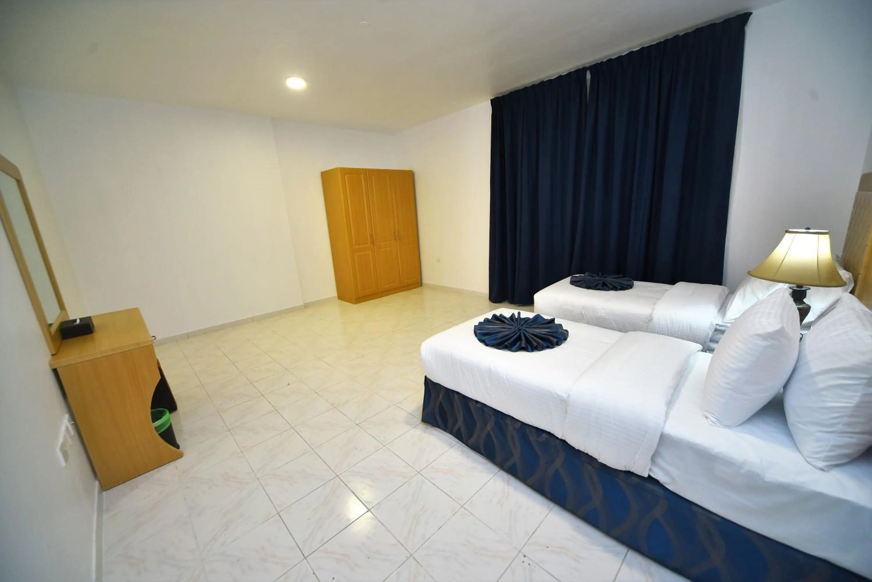 Bed in Alain Hotel Apartments Ajman