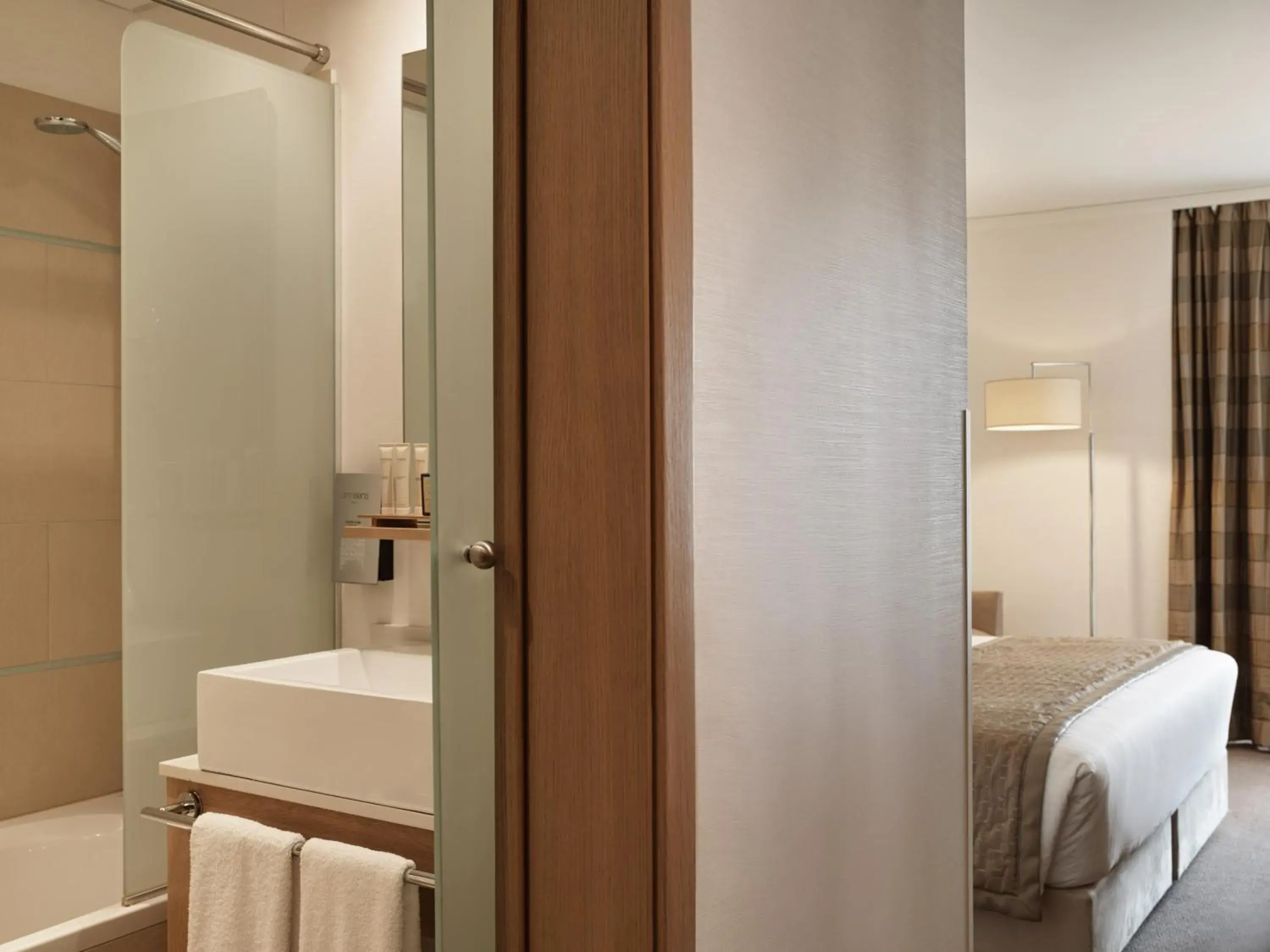 Bathroom, Bed in Galaxy Iraklio Hotel Bathroom, Bed in Galaxy Iraklio Hotel