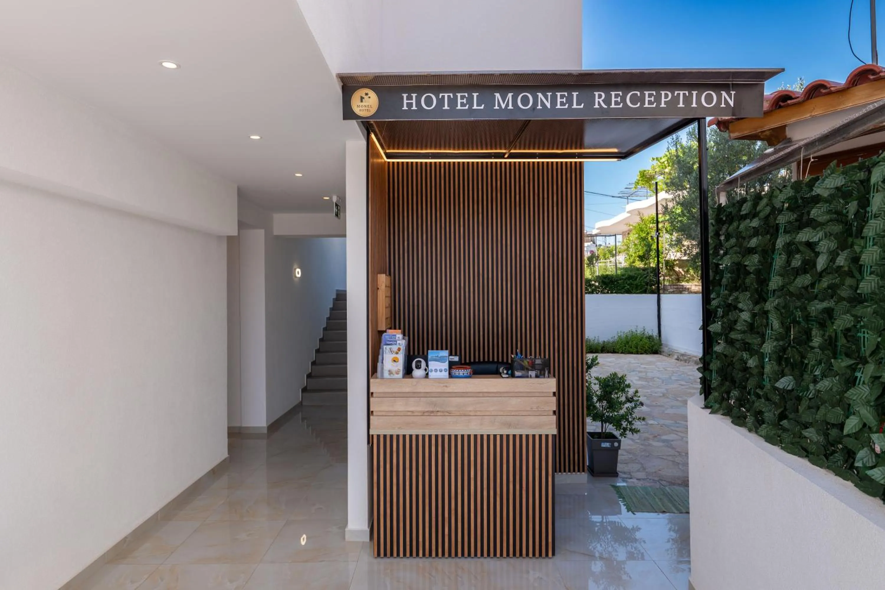 Lobby or reception in Monel Hotel