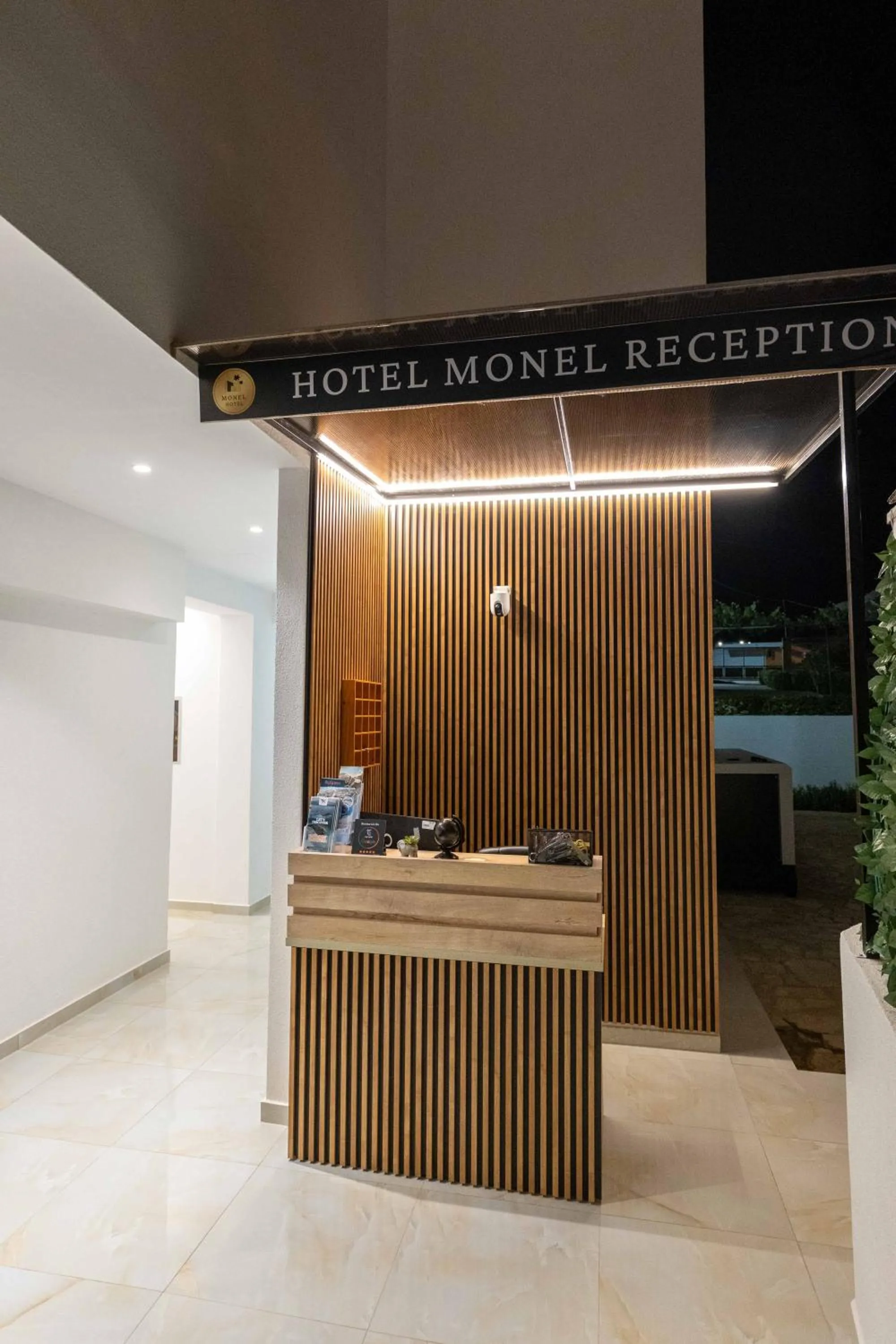 Lobby or reception in Monel Hotel