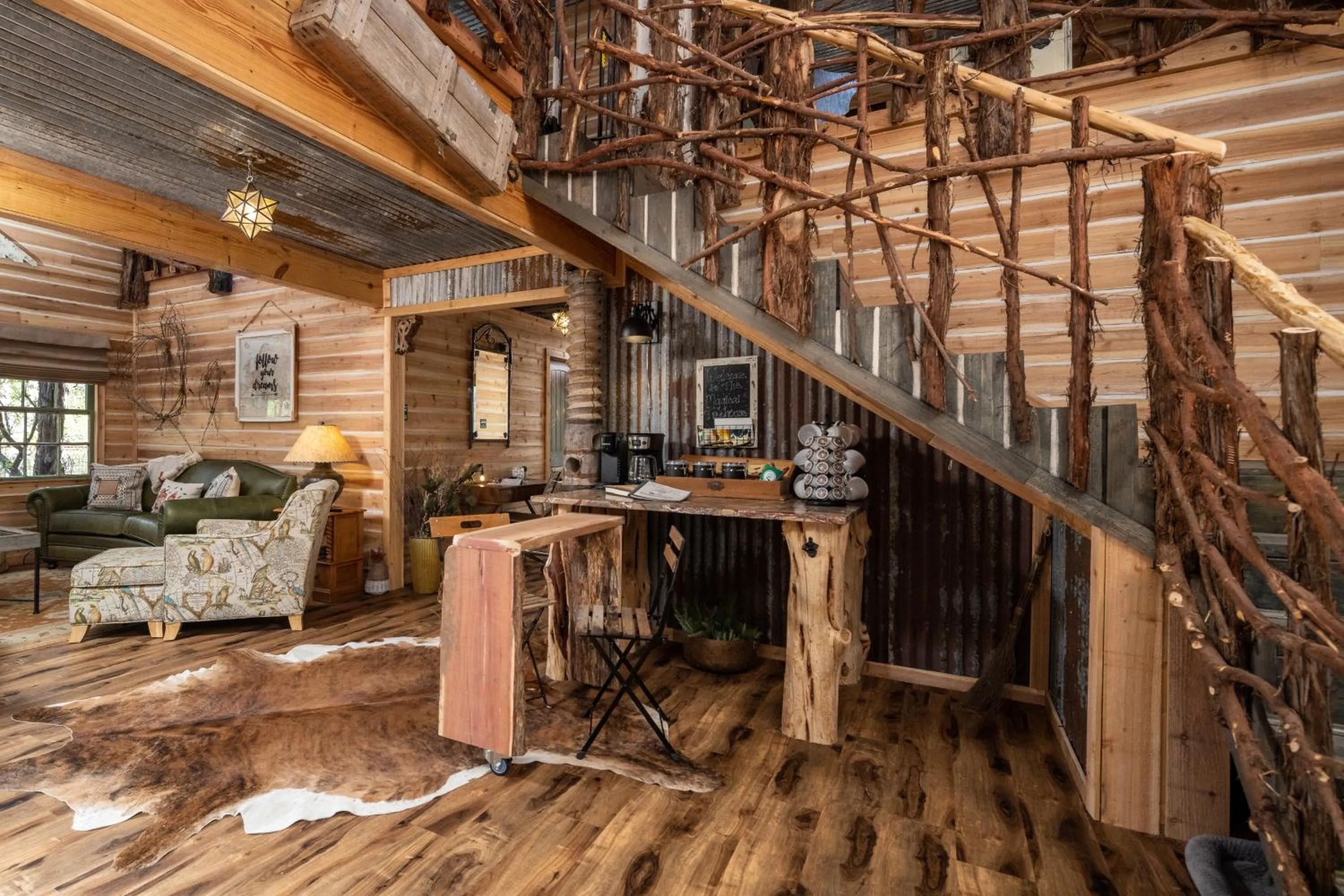 Kitchen or kitchenette in "Magical Treehouse" w spiral slide off the deck 350 acres on the Brazos River! Tubing! Petting Zoo!