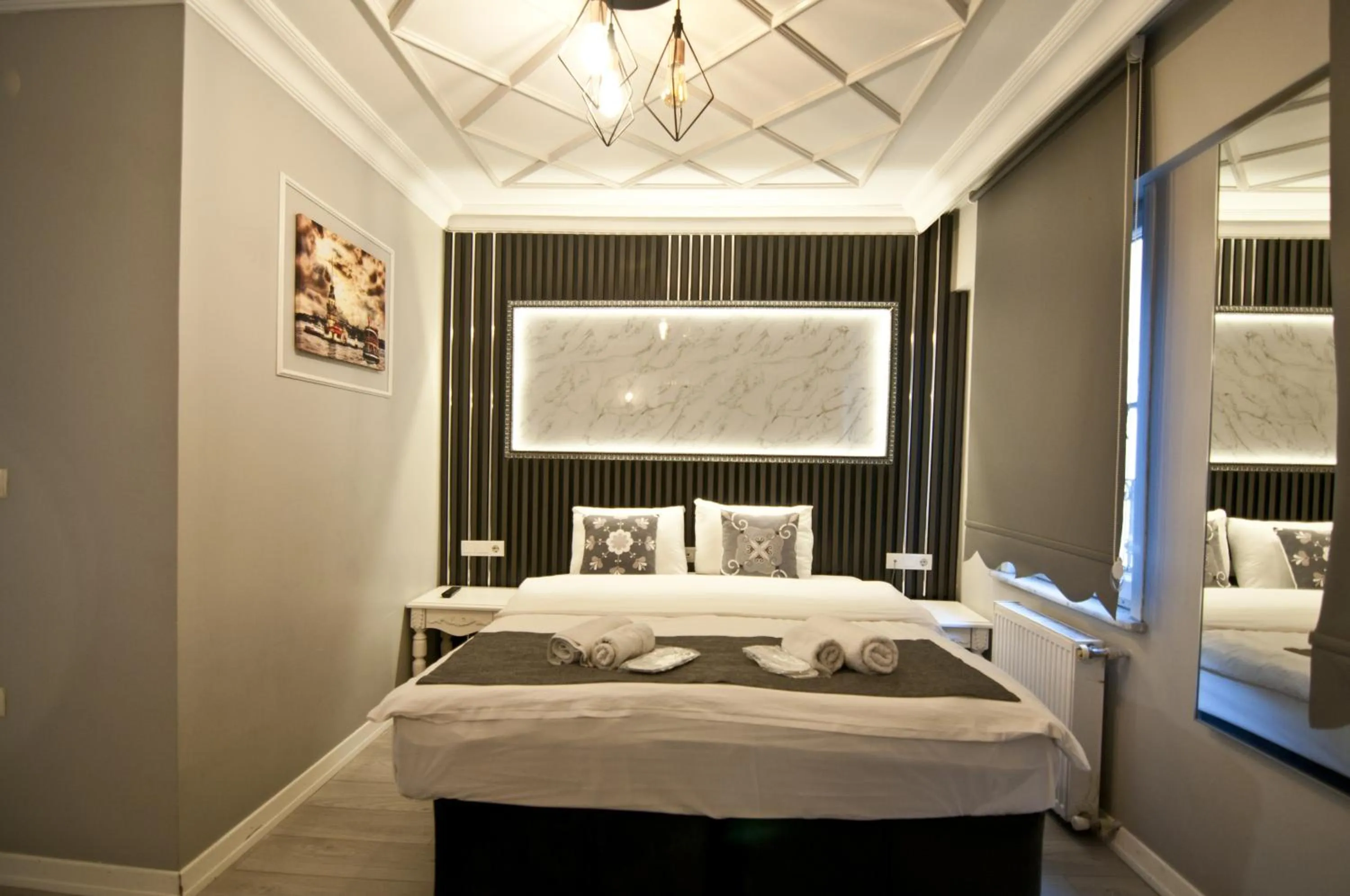 Bed in Nova City Hotel