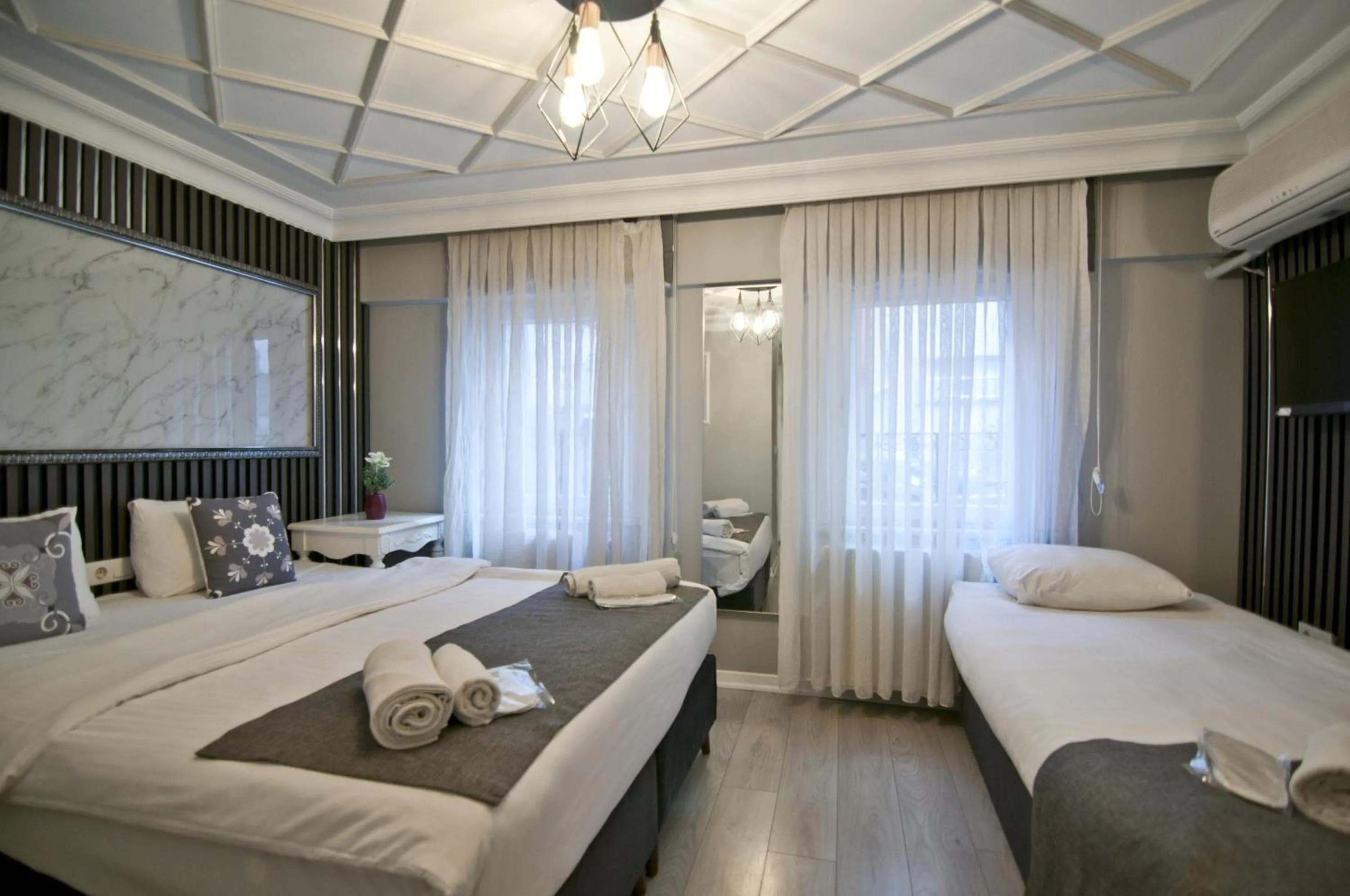 Bed in Nova City Hotel