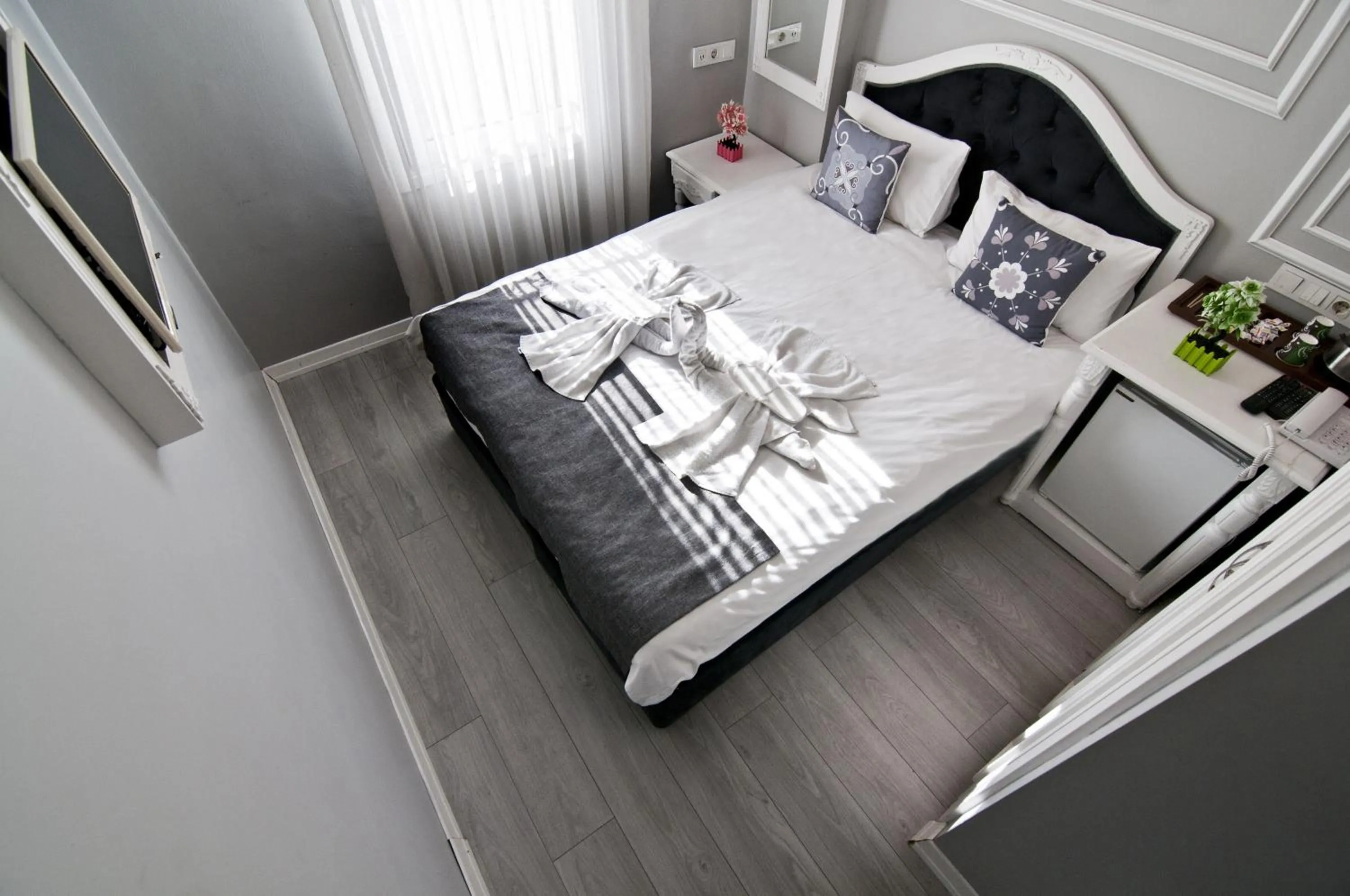 Bed in Nova City Hotel