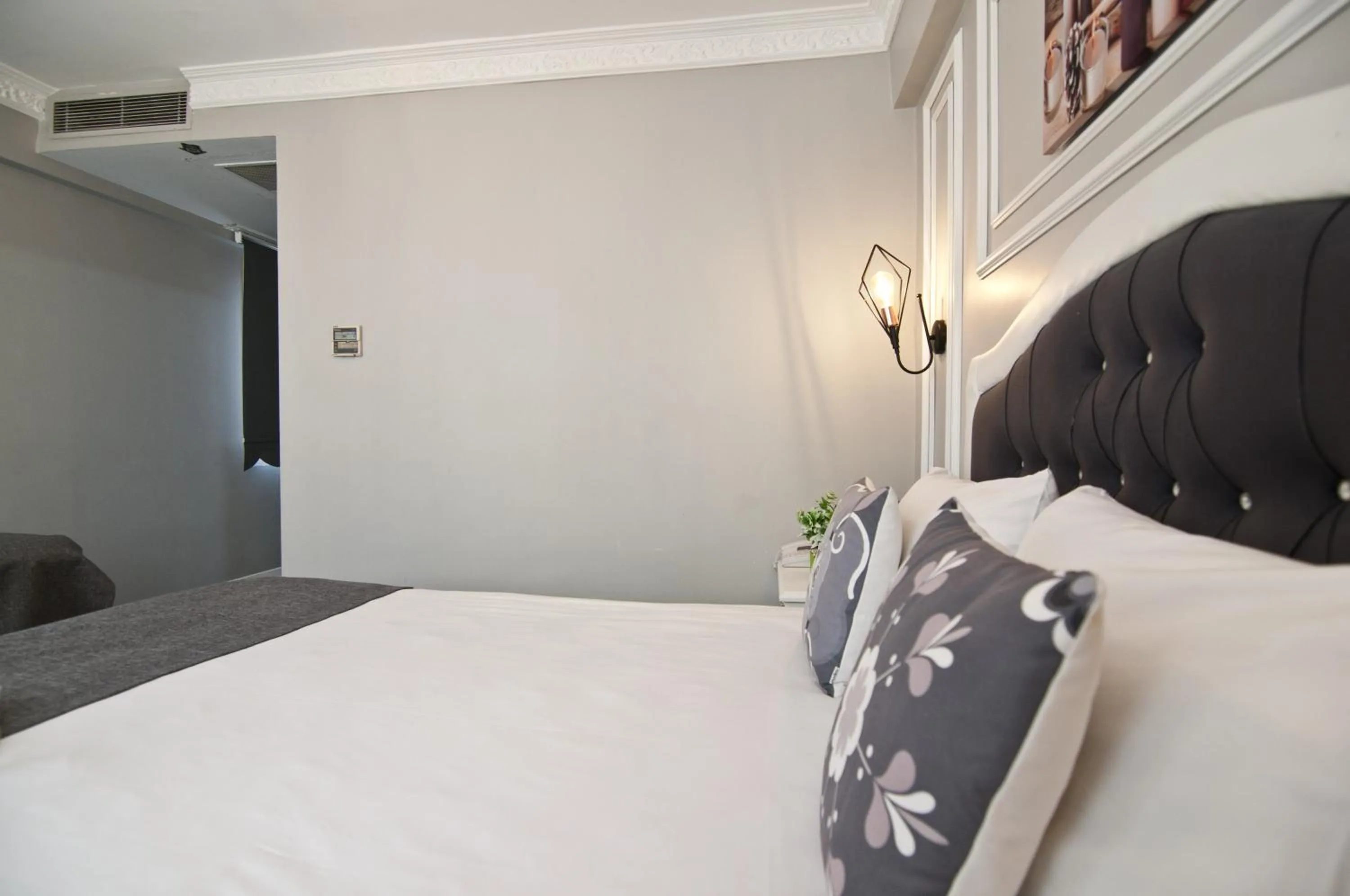 Bed in Nova City Hotel