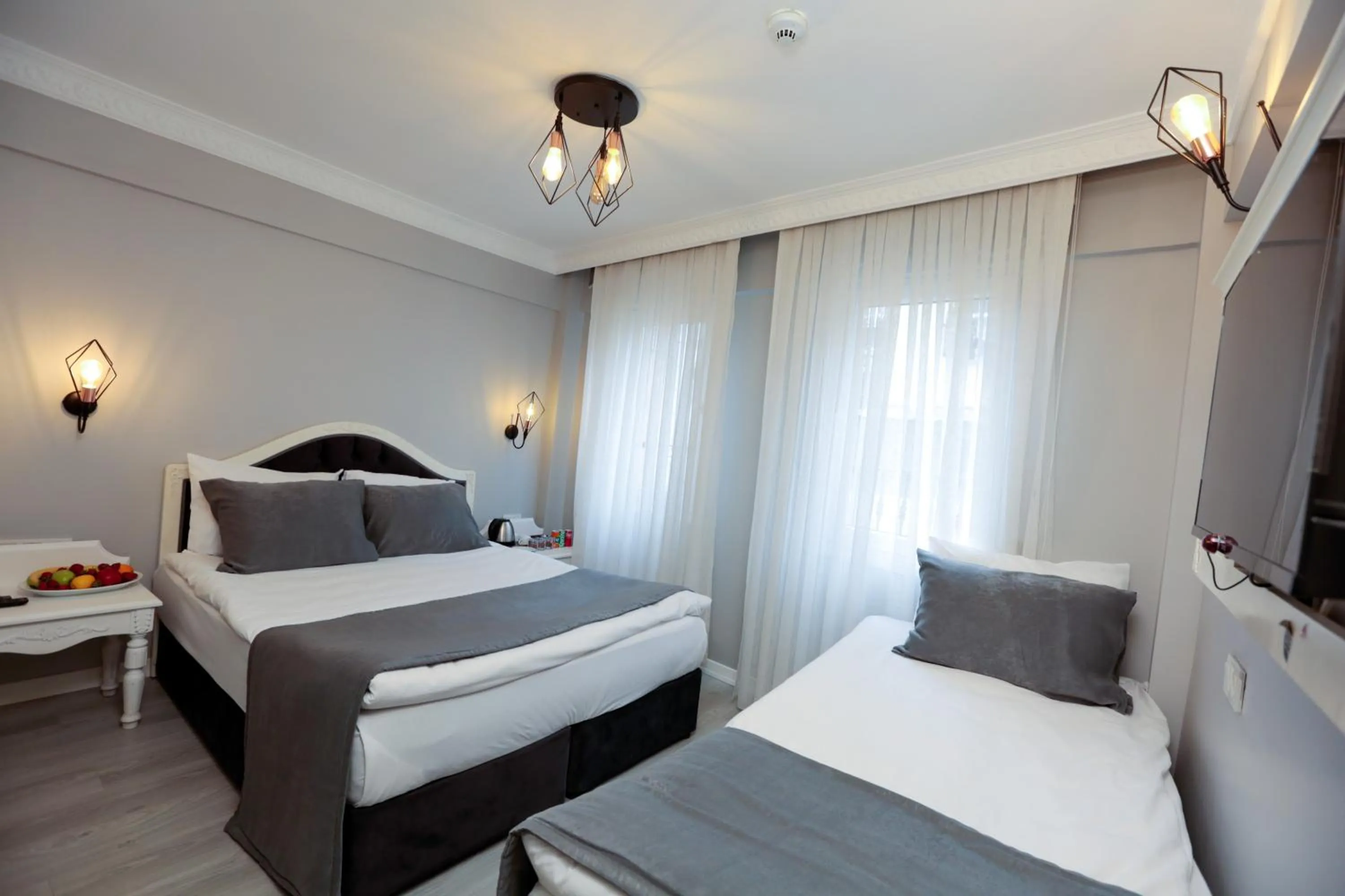 Photo of the whole room, Bed in Nova City Hotel