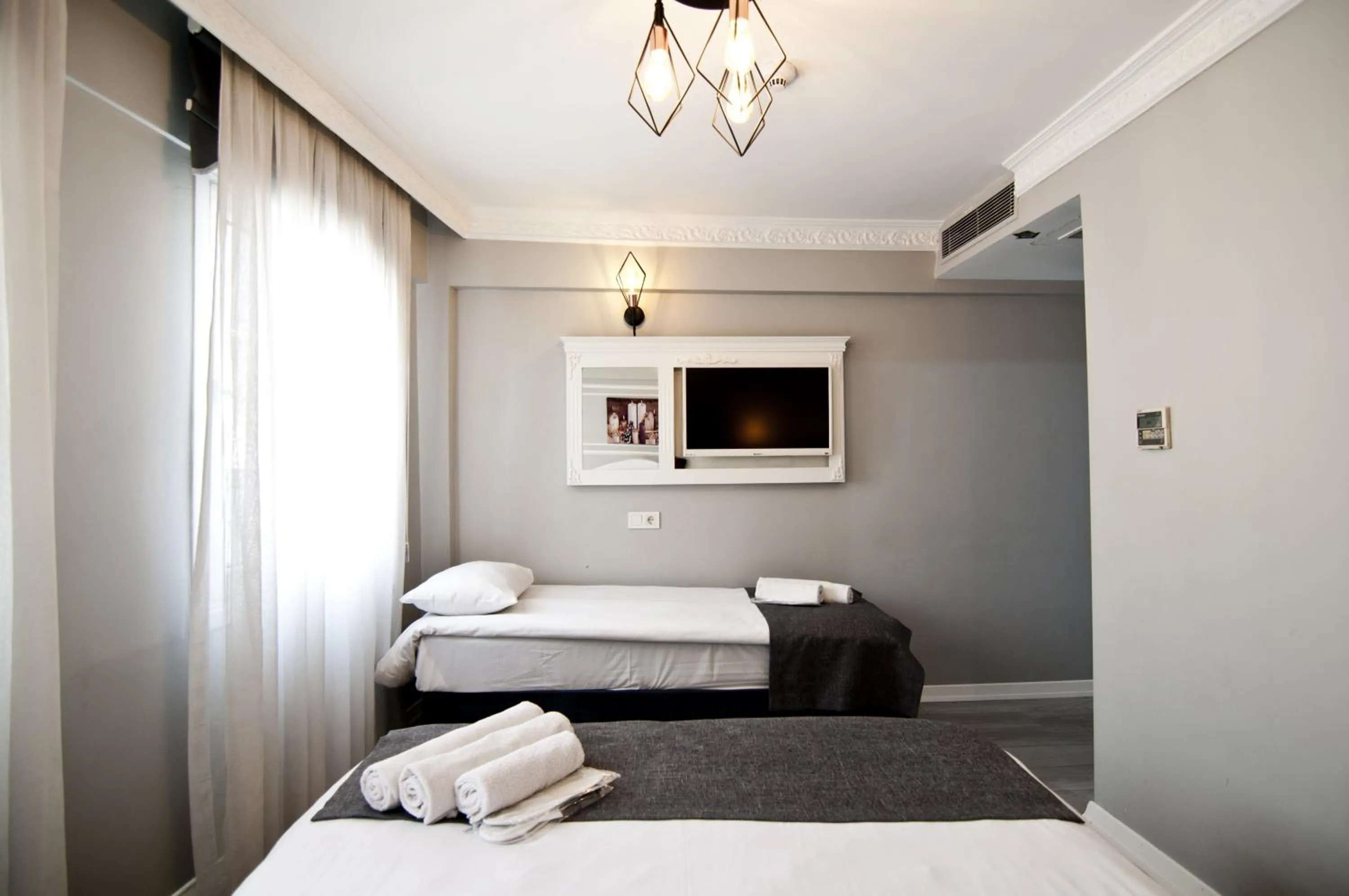 Bed in Nova City Hotel