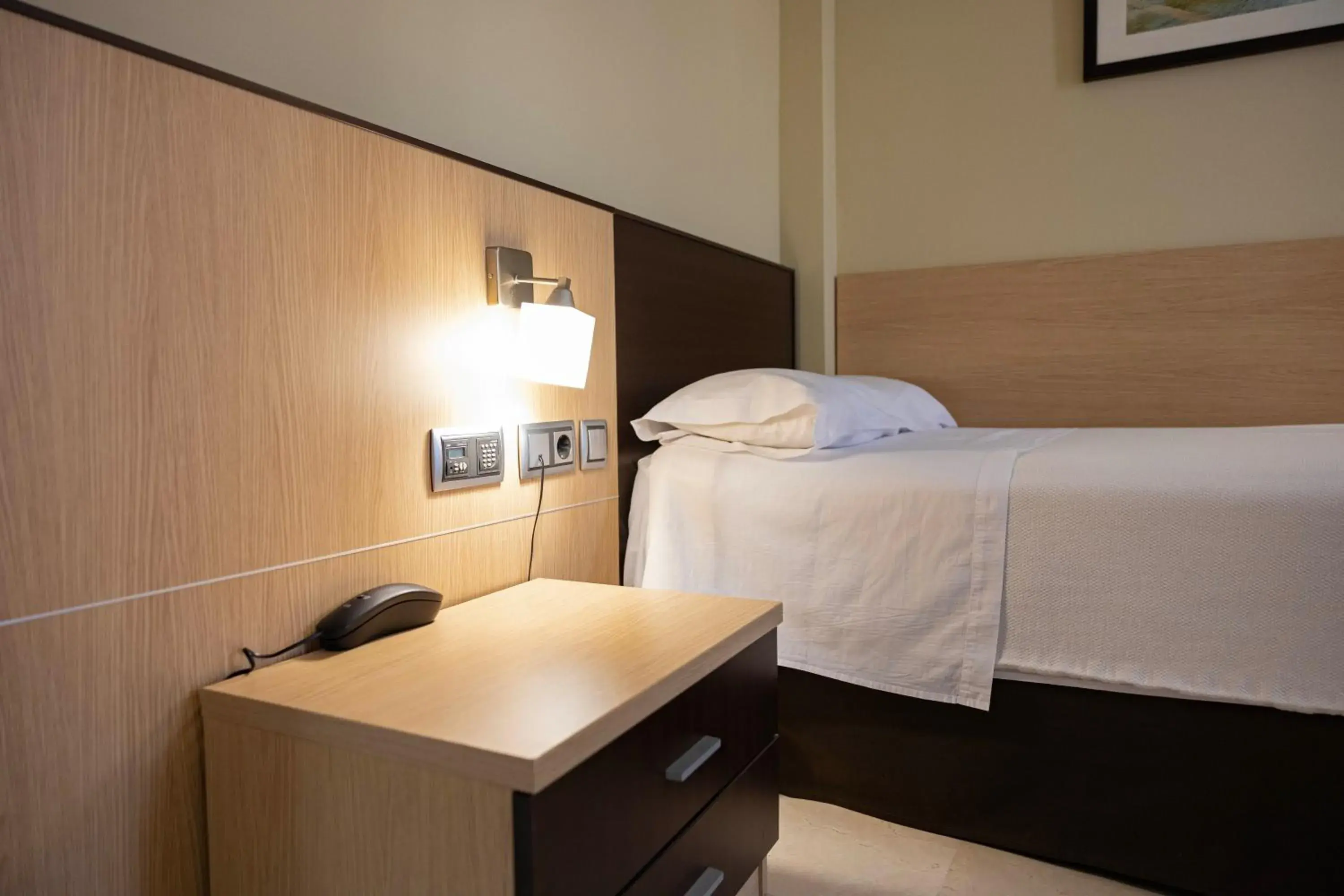 Bed in Hotel Flamingo Bed in Hotel Flamingo