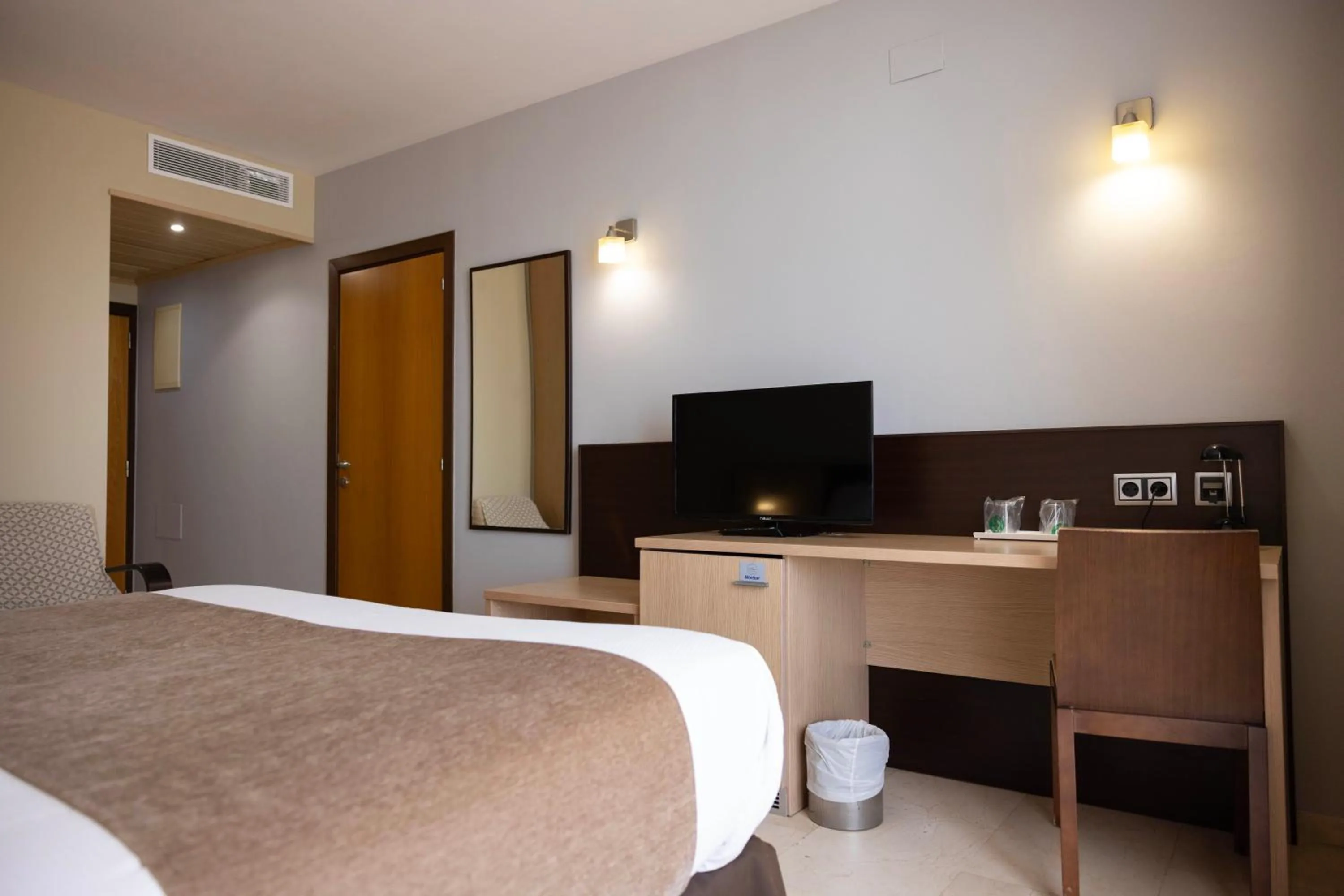 Bed in Hotel Flamingo