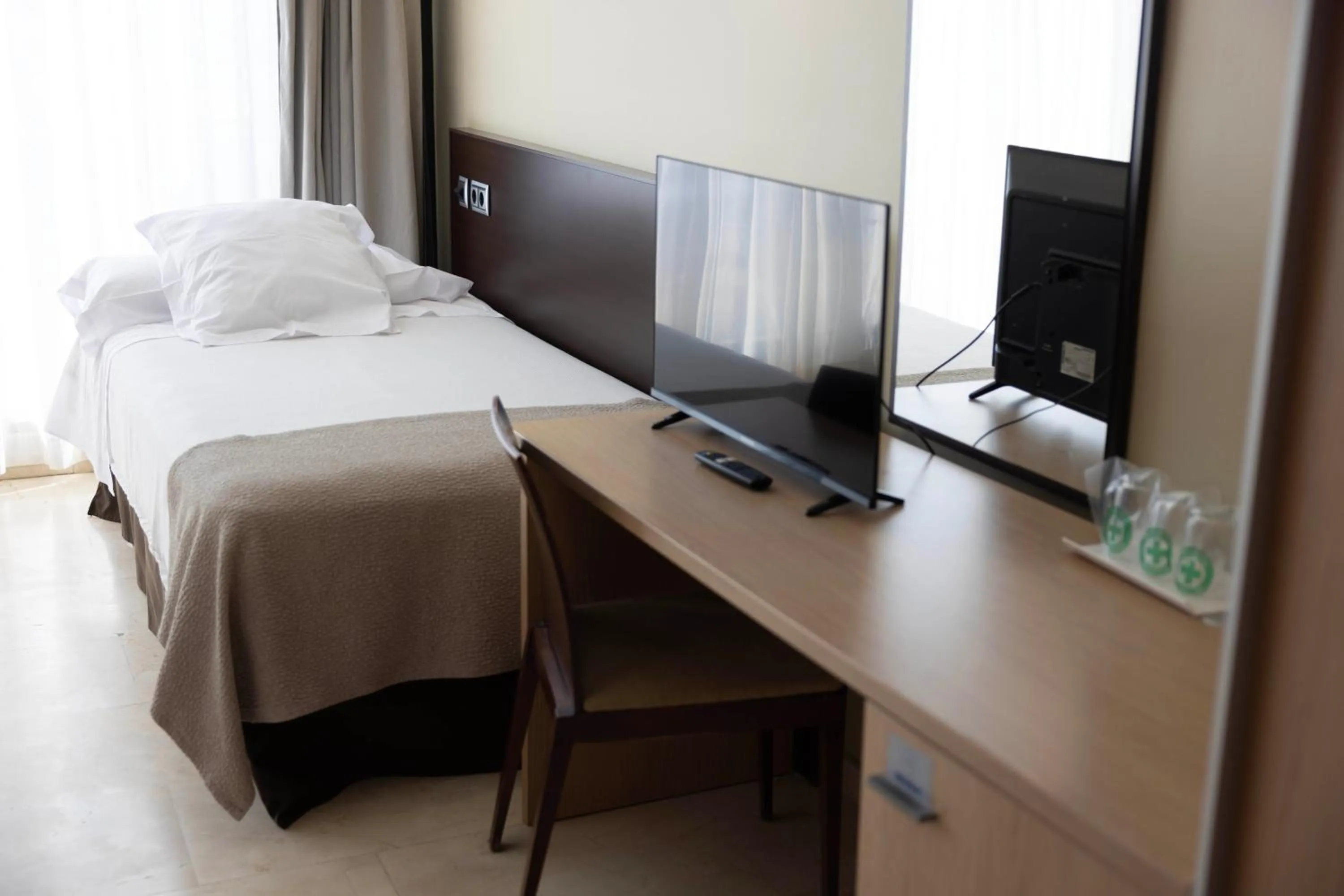 Bed in Hotel Flamingo