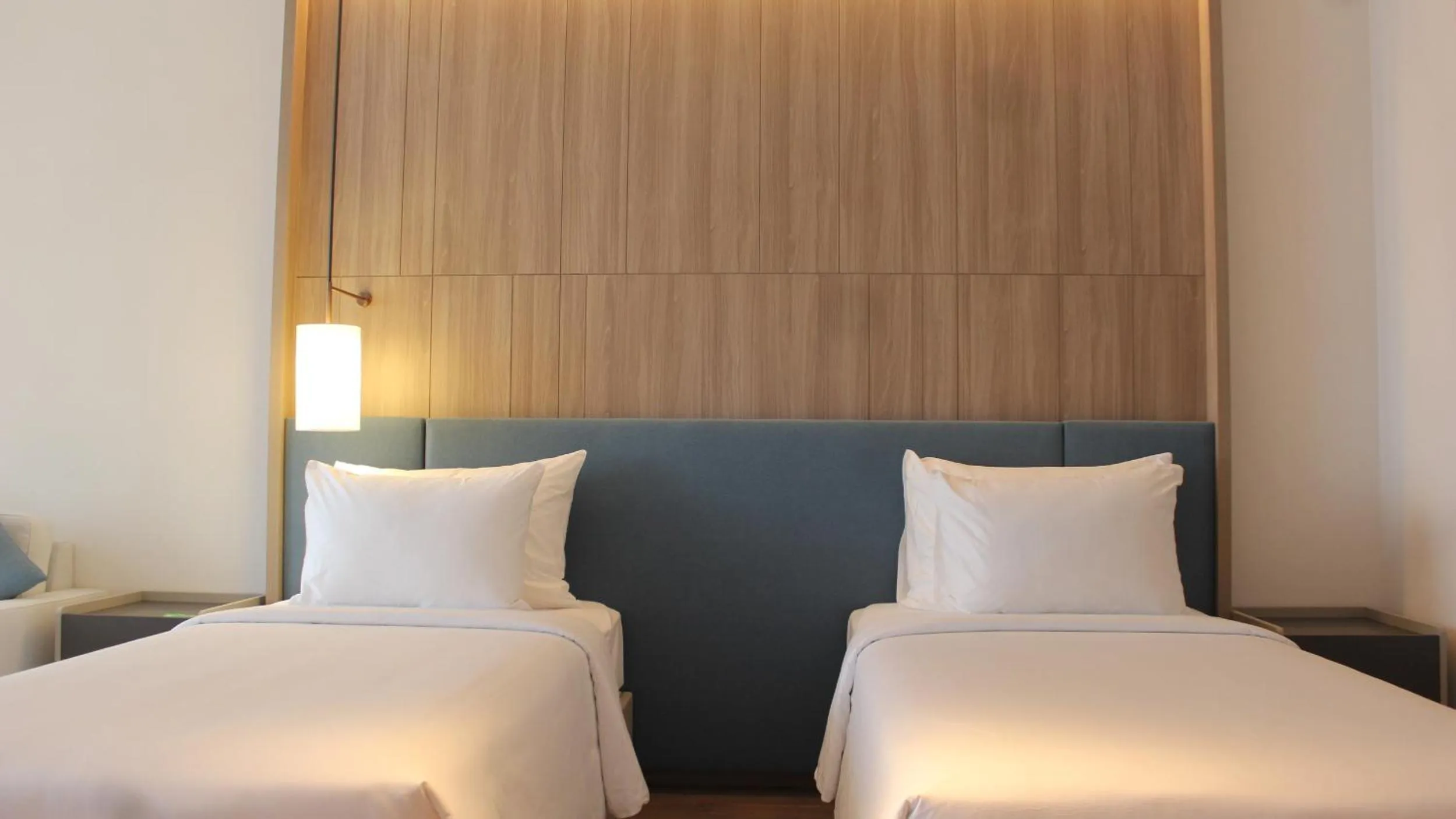 Bed in A La Carte Ha Long Bay Residence