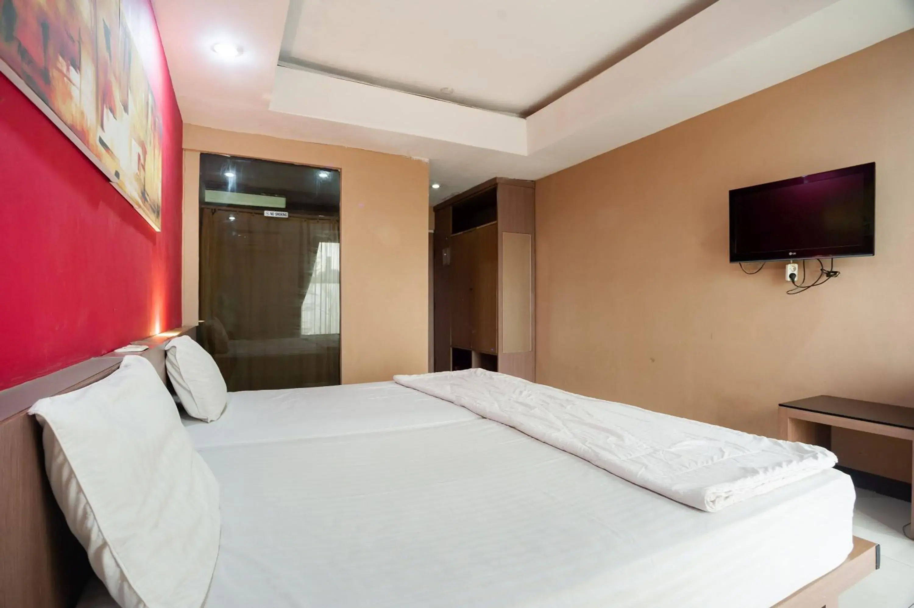 Deluxe Room in Safwah Bintaro Syariah Mitra RedDoorz Deluxe Room in Safwah Bintaro Syariah Mitra RedDoorz