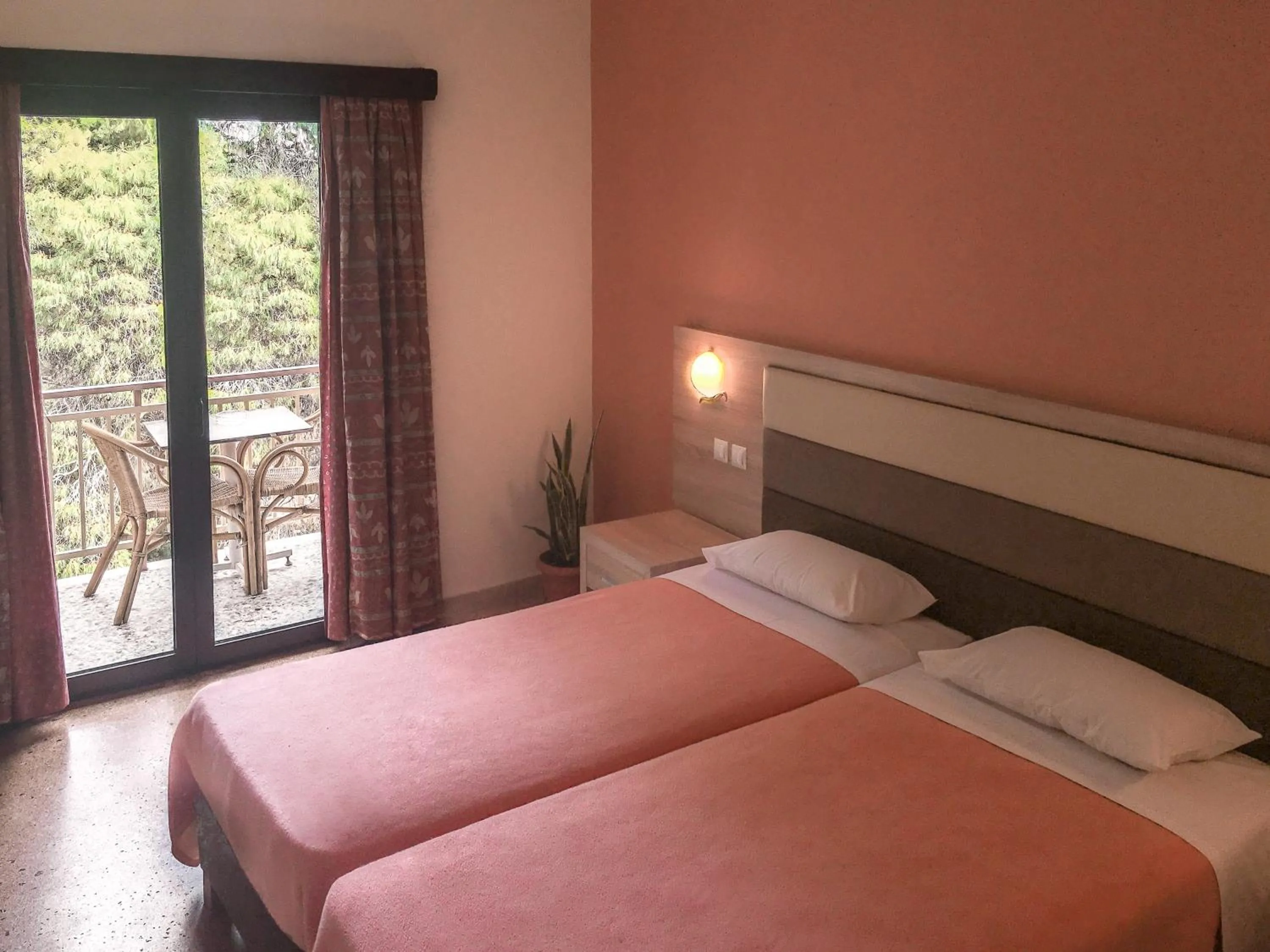 Bed in The Delfini Hotel