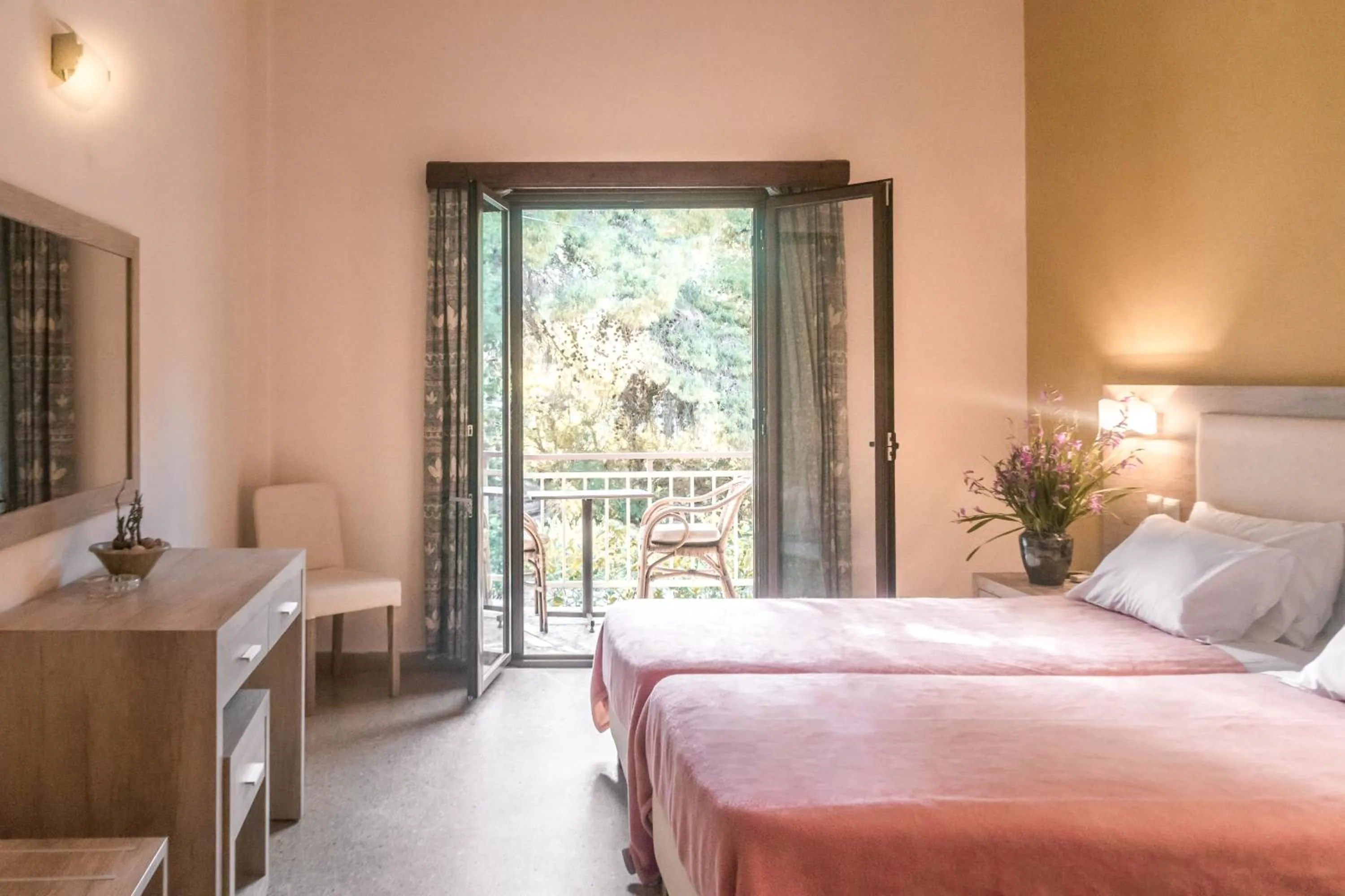 Bed in The Delfini Hotel