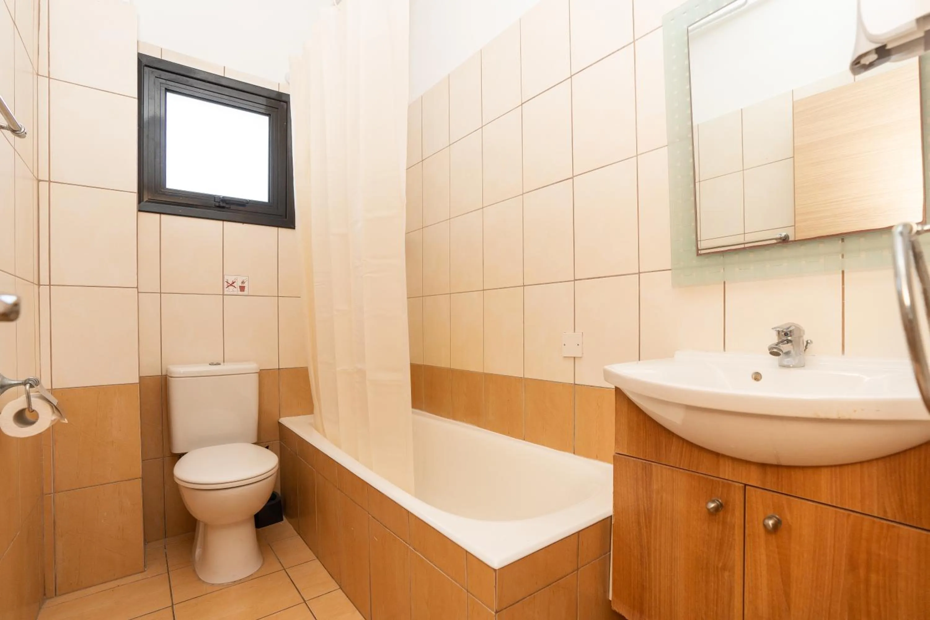 Toilet in Flora Hotel Apartments