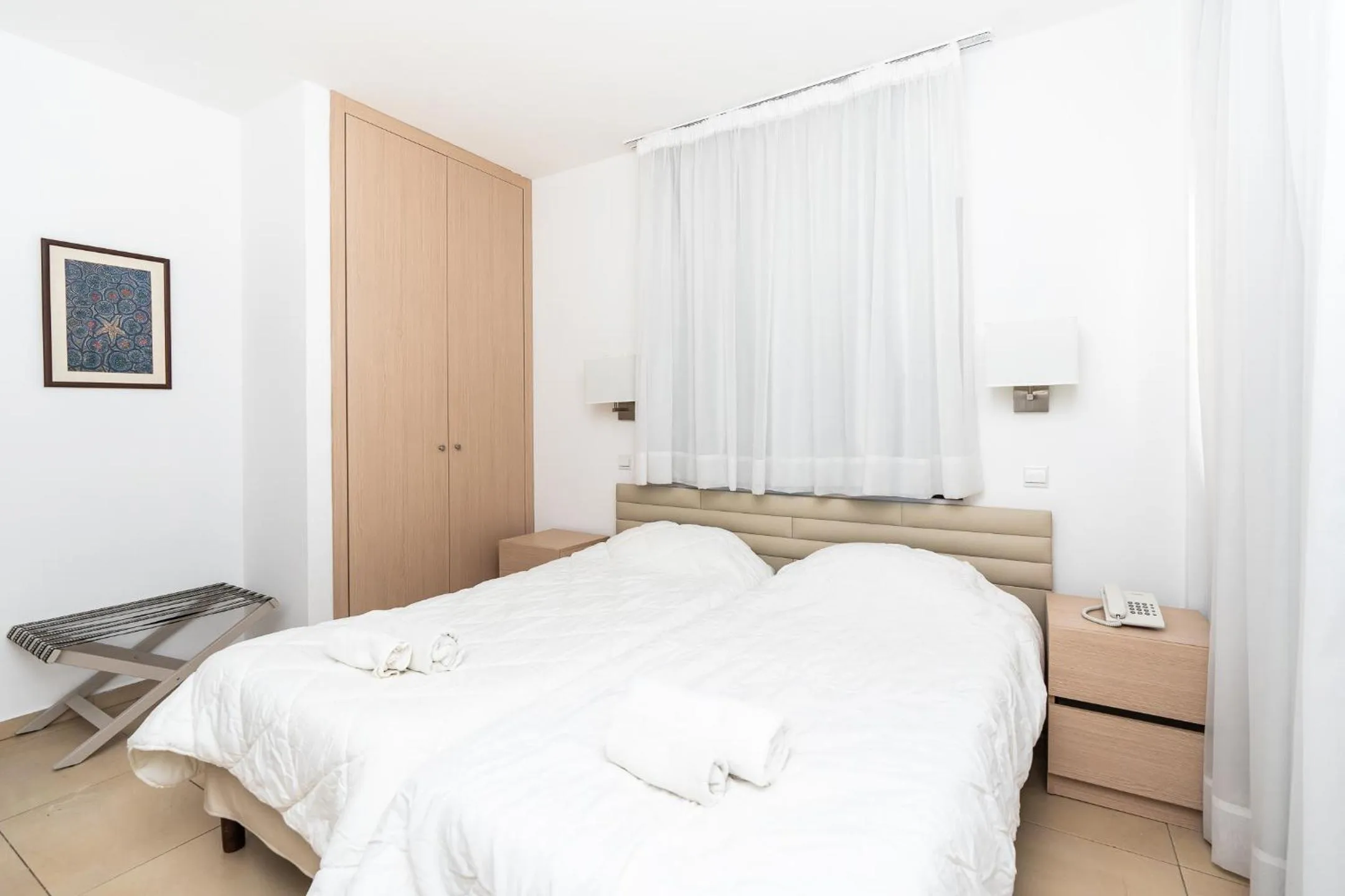 Bedroom, Bed in Flora Hotel Apartments