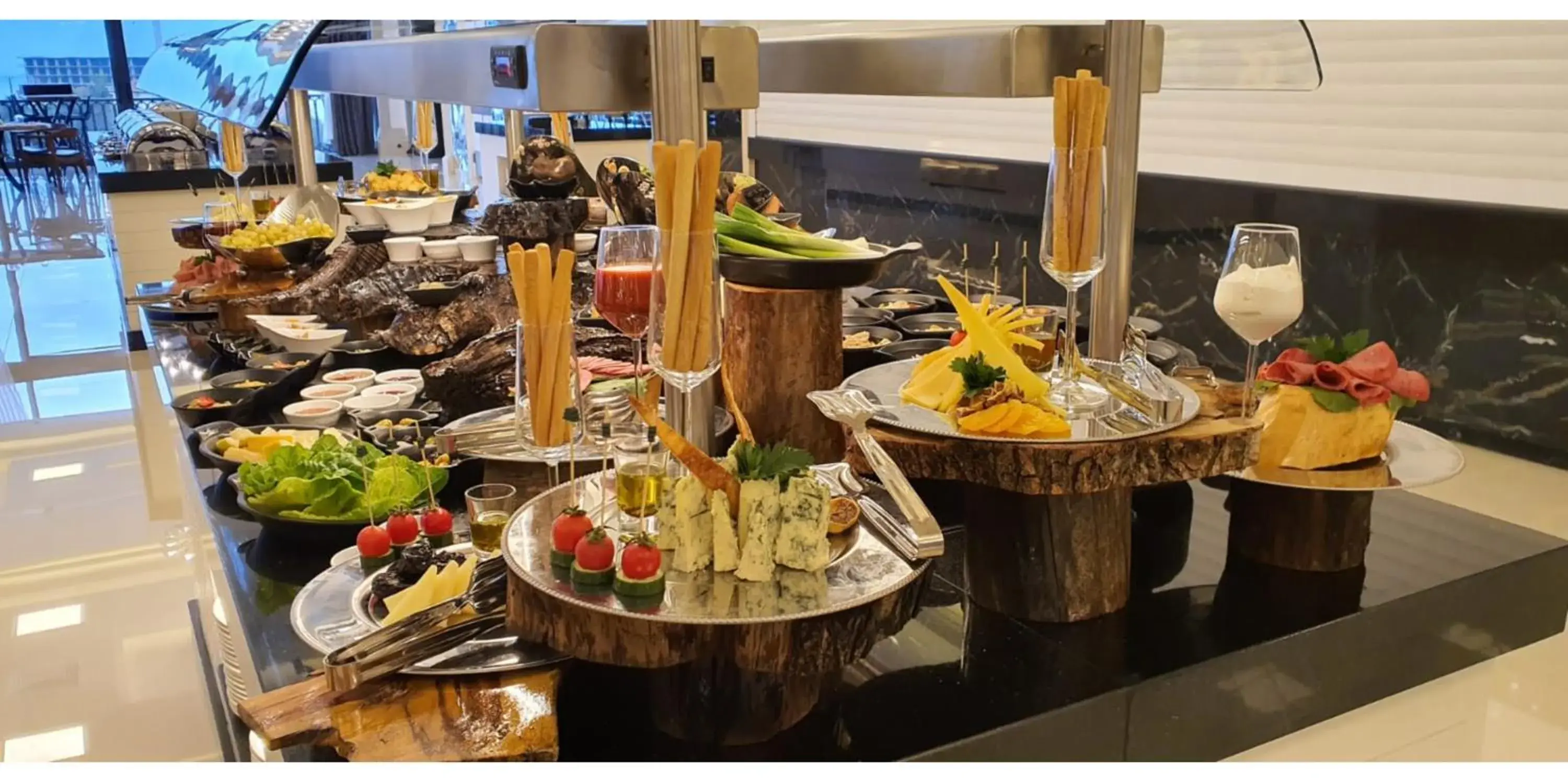 Buffet breakfast in Mc Palace Hotel Spa & Convention Buffet breakfast in Mc Palace Hotel Spa & Convention