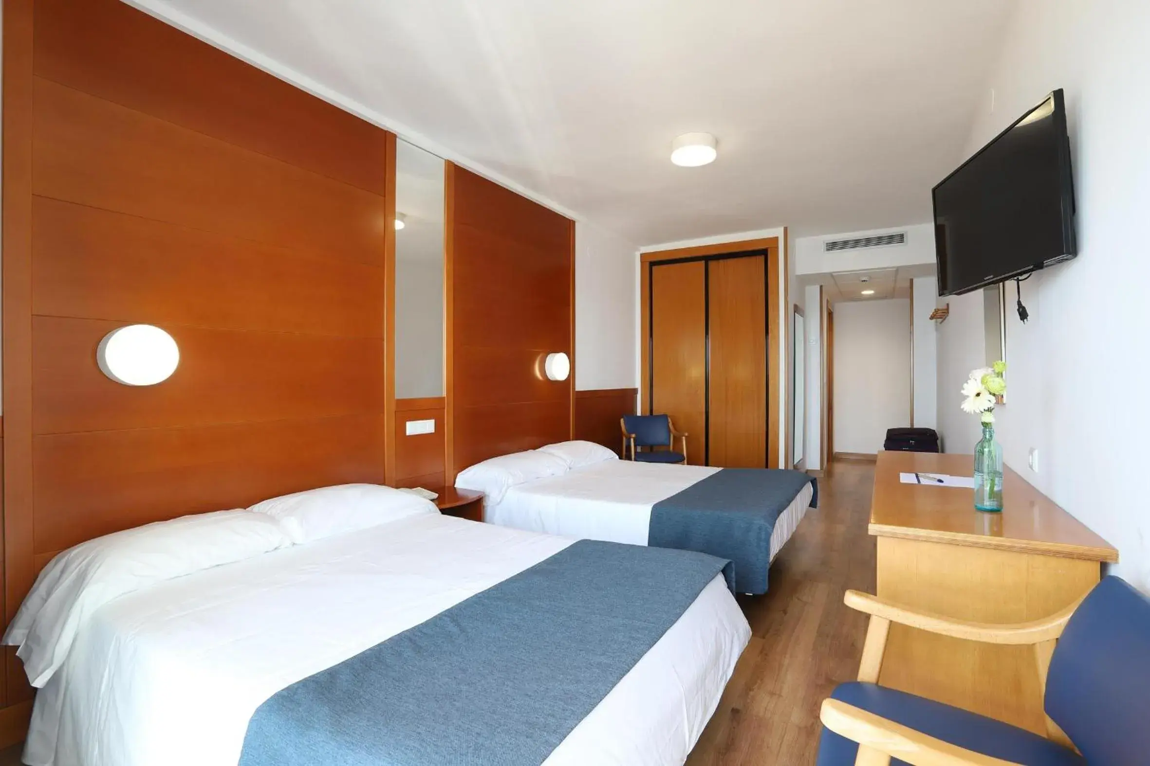 Photo of the whole room, Bed in Hotel Poseidon Playa Photo of the whole room, Bed in Hotel Poseidon Playa