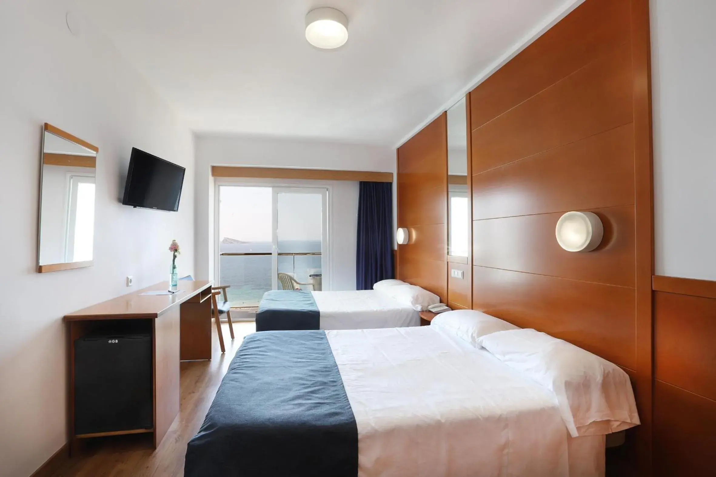 Photo of the whole room, Bed in Hotel Poseidon Playa Photo of the whole room, Bed in Hotel Poseidon Playa