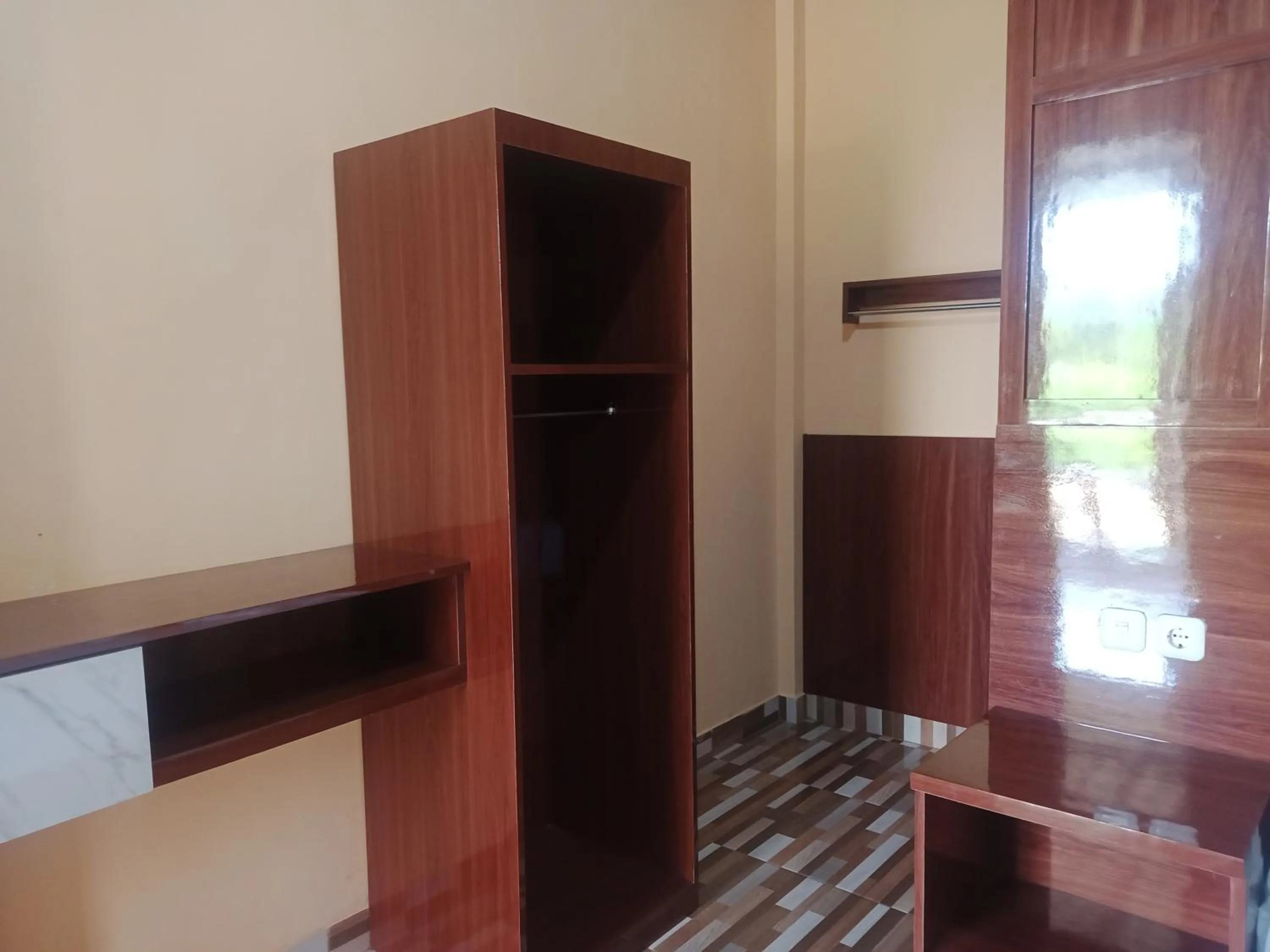 wardrobe in An Nur Homestay Bira Beach