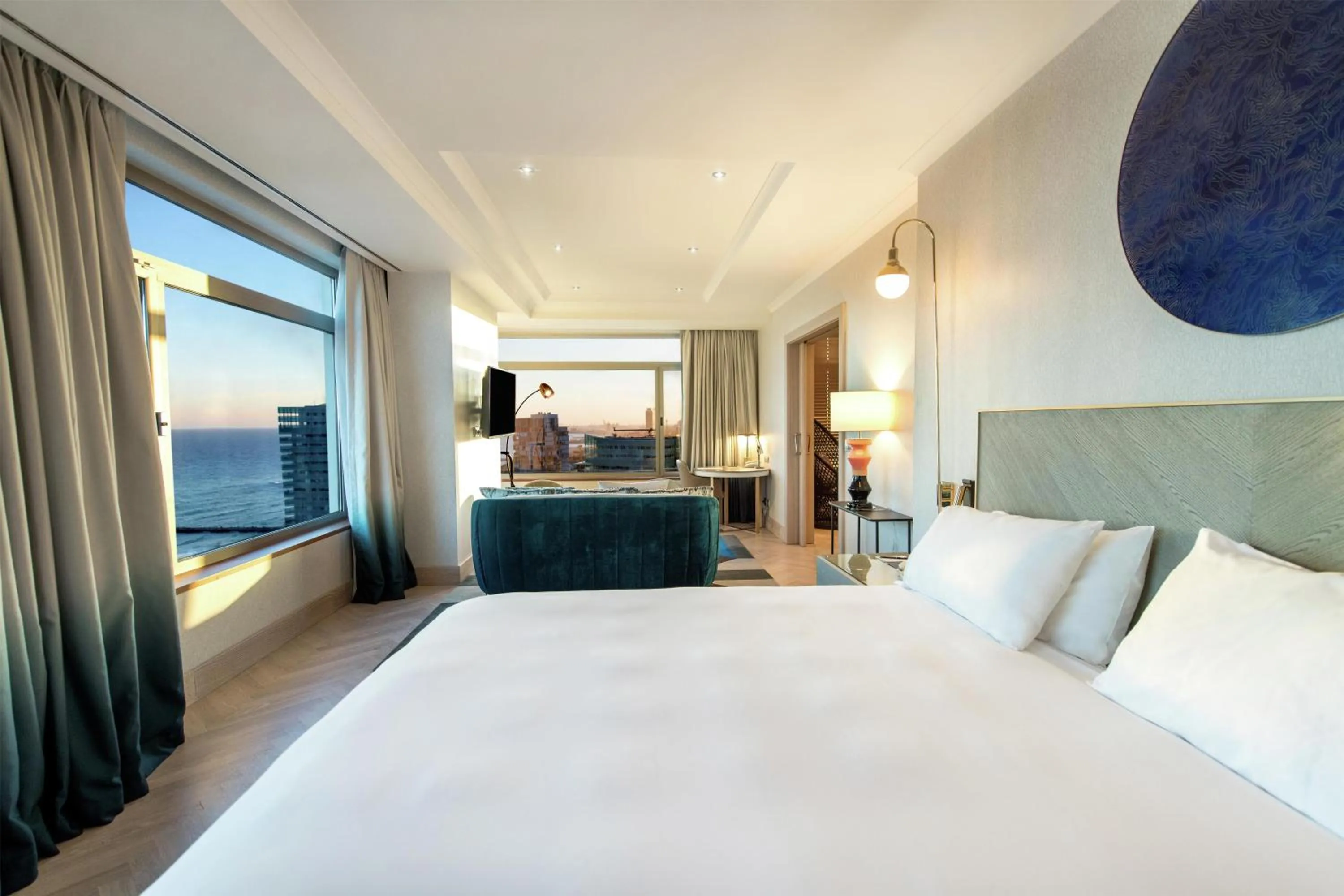 Living room, Bed in Hilton Diagonal Mar Barcelona
