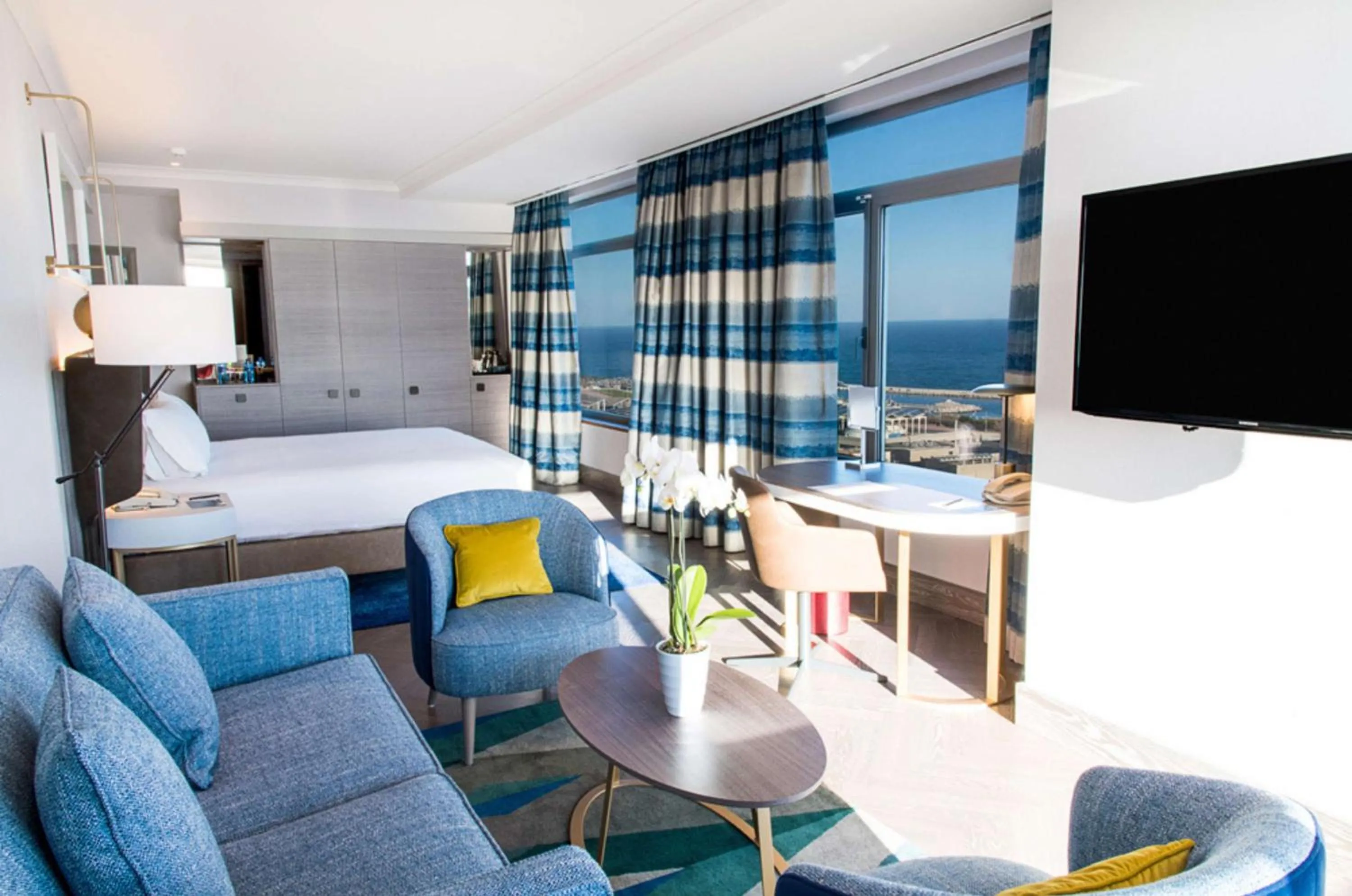 Living room, Bed in Hilton Diagonal Mar Barcelona